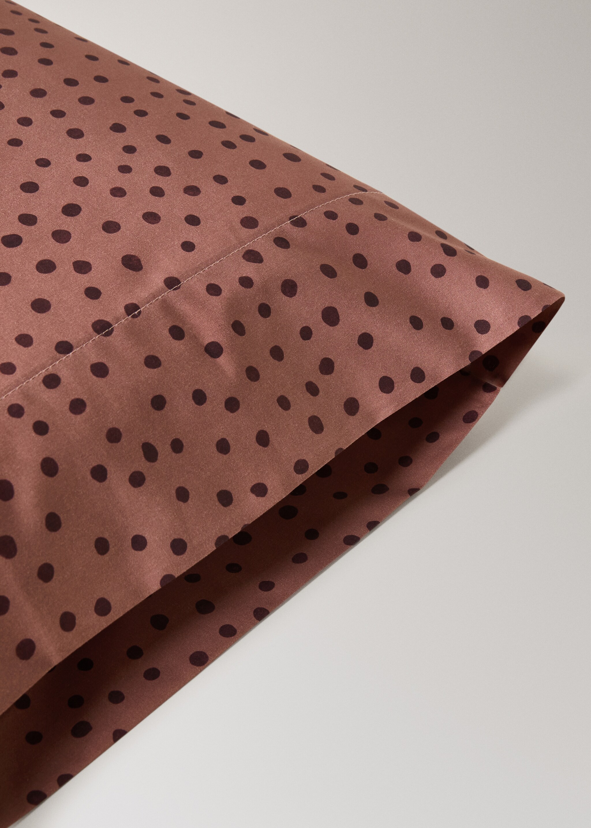 200 thread count cotton percale pillowcase with polka dot print 45x110 cm - Details of the article 1, Burnt Orange. Ref: 17011630-00.
