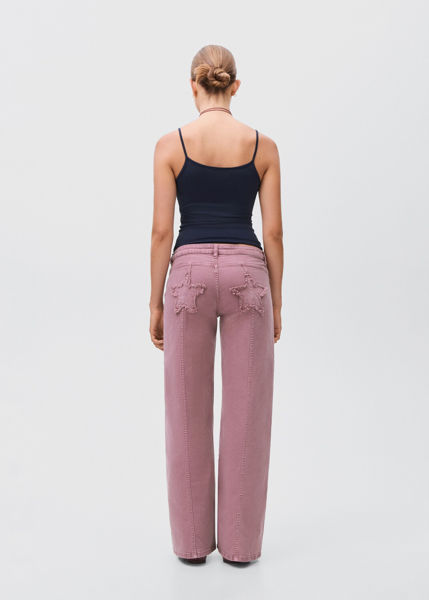Straight jeans with stars - Reverse of the article