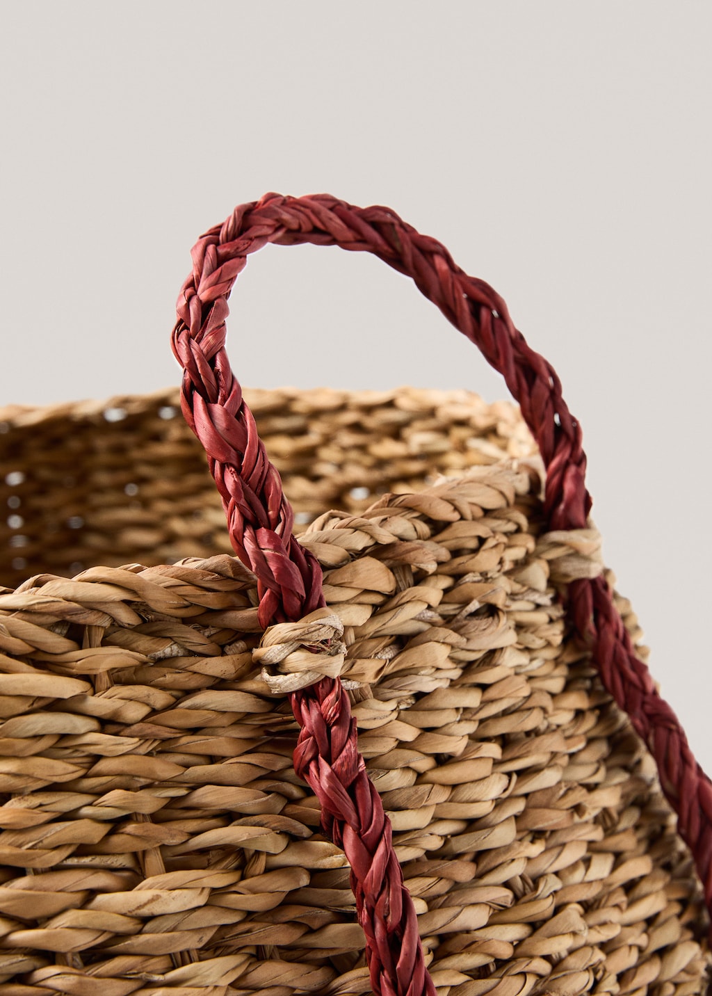 Natural fibre coloured hand basket