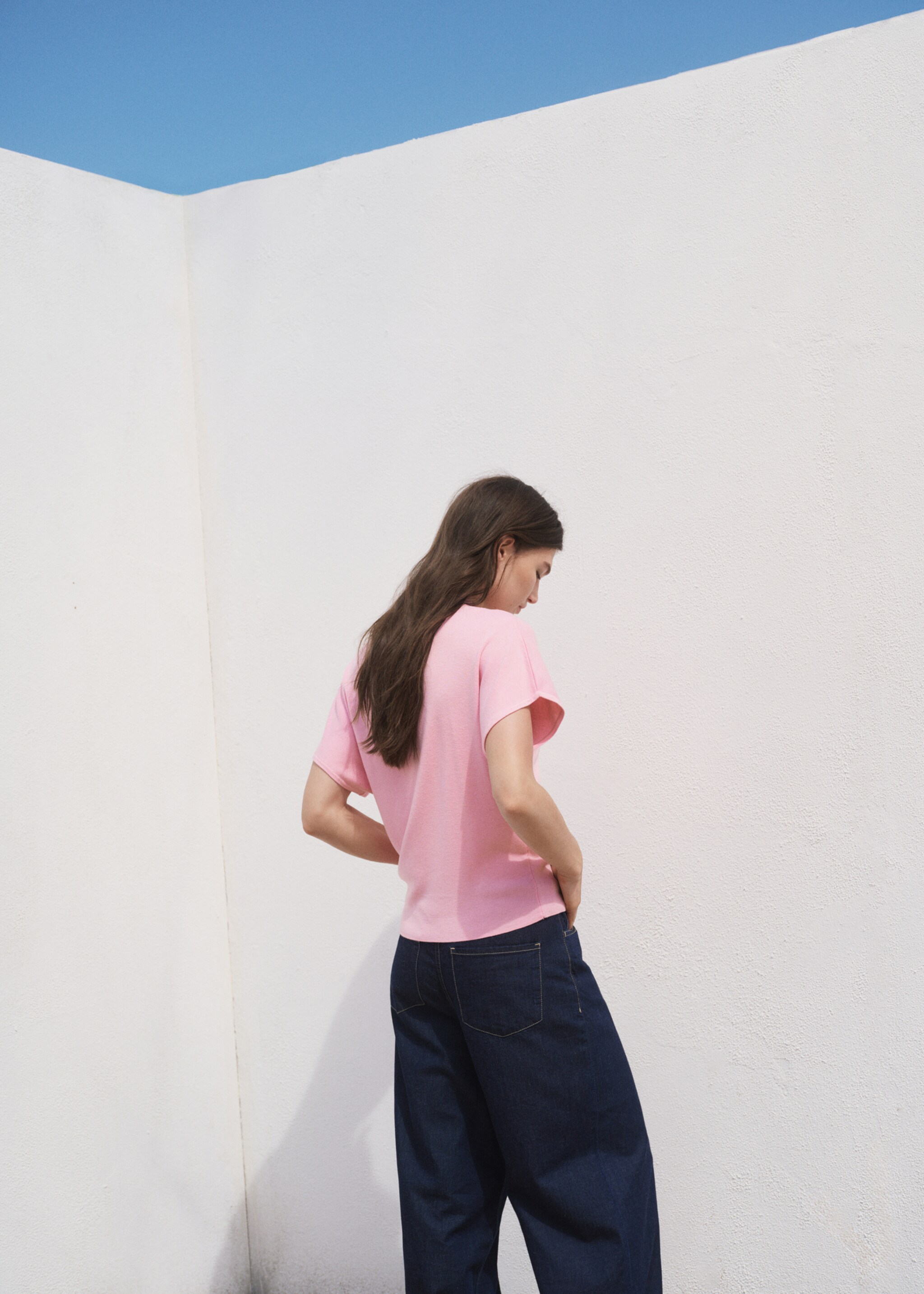 Short-sleeved polo-neck sweater - Reverse of the article
