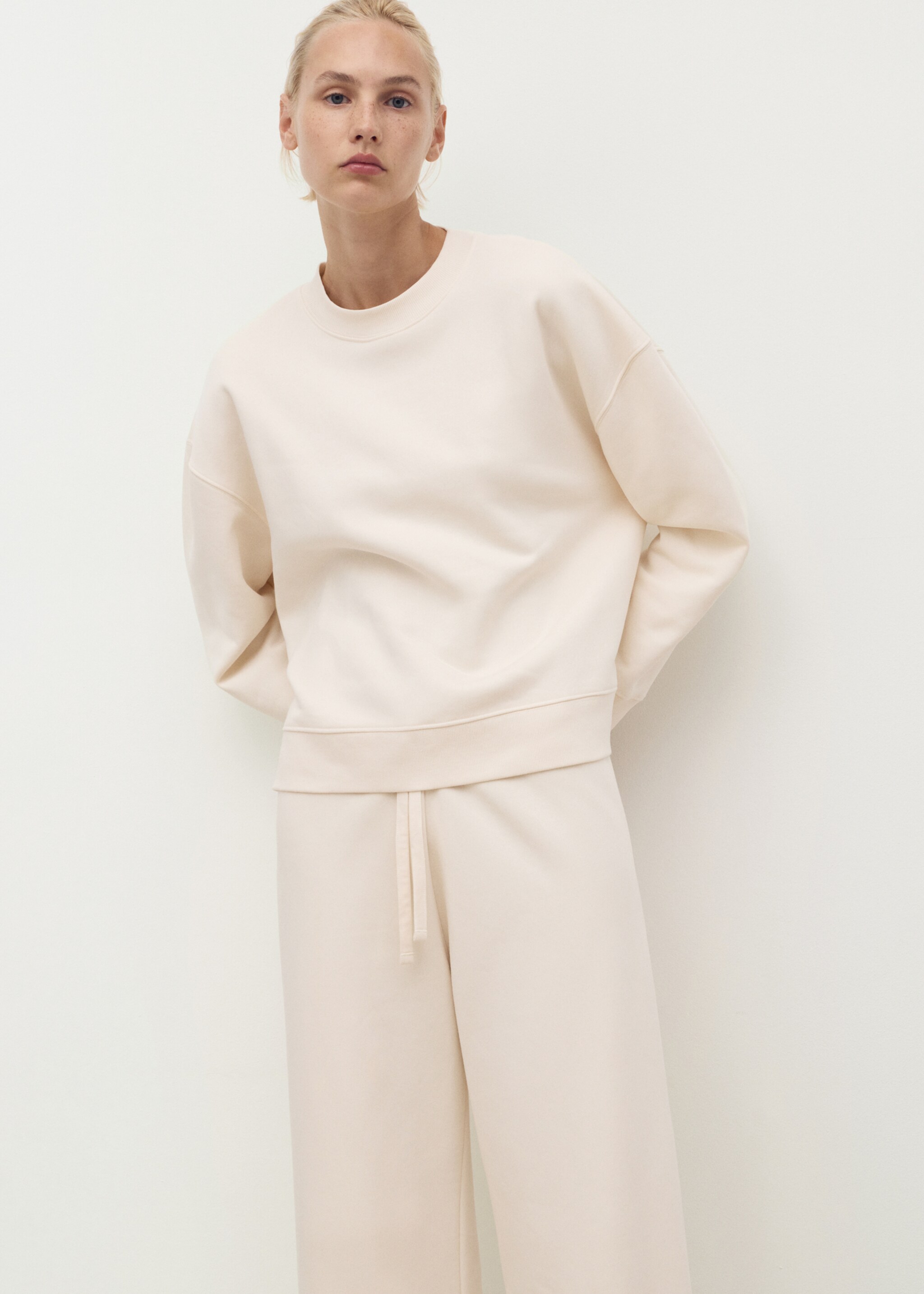 Fluid long cotton trousers - Details of the article 1, Vanilla. Ref: 17014108-00.