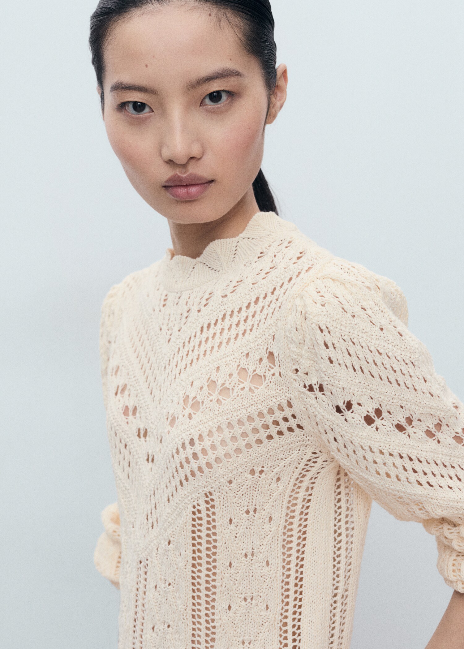 Knitted sweater with openwork details - Medium plane