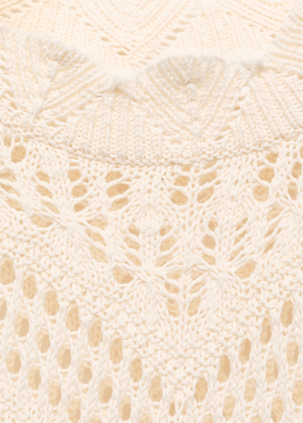 Knitted sweater with lace accents