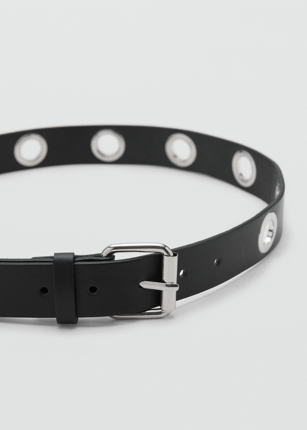 Belt with metal eyelets