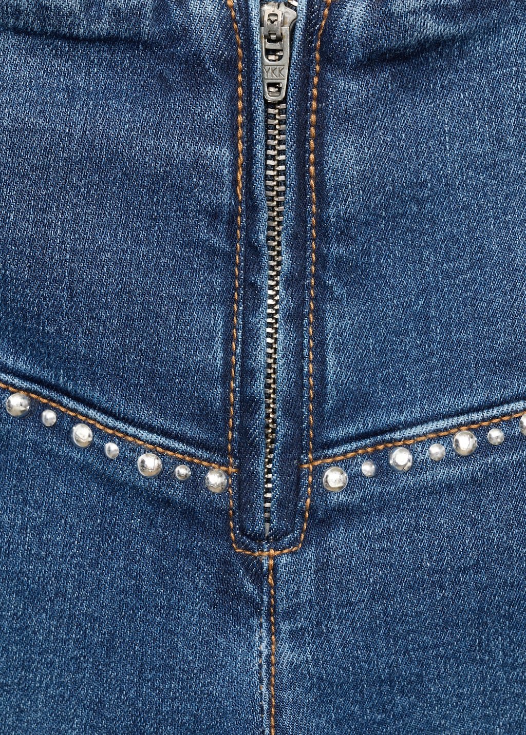Low-waist studded jeans