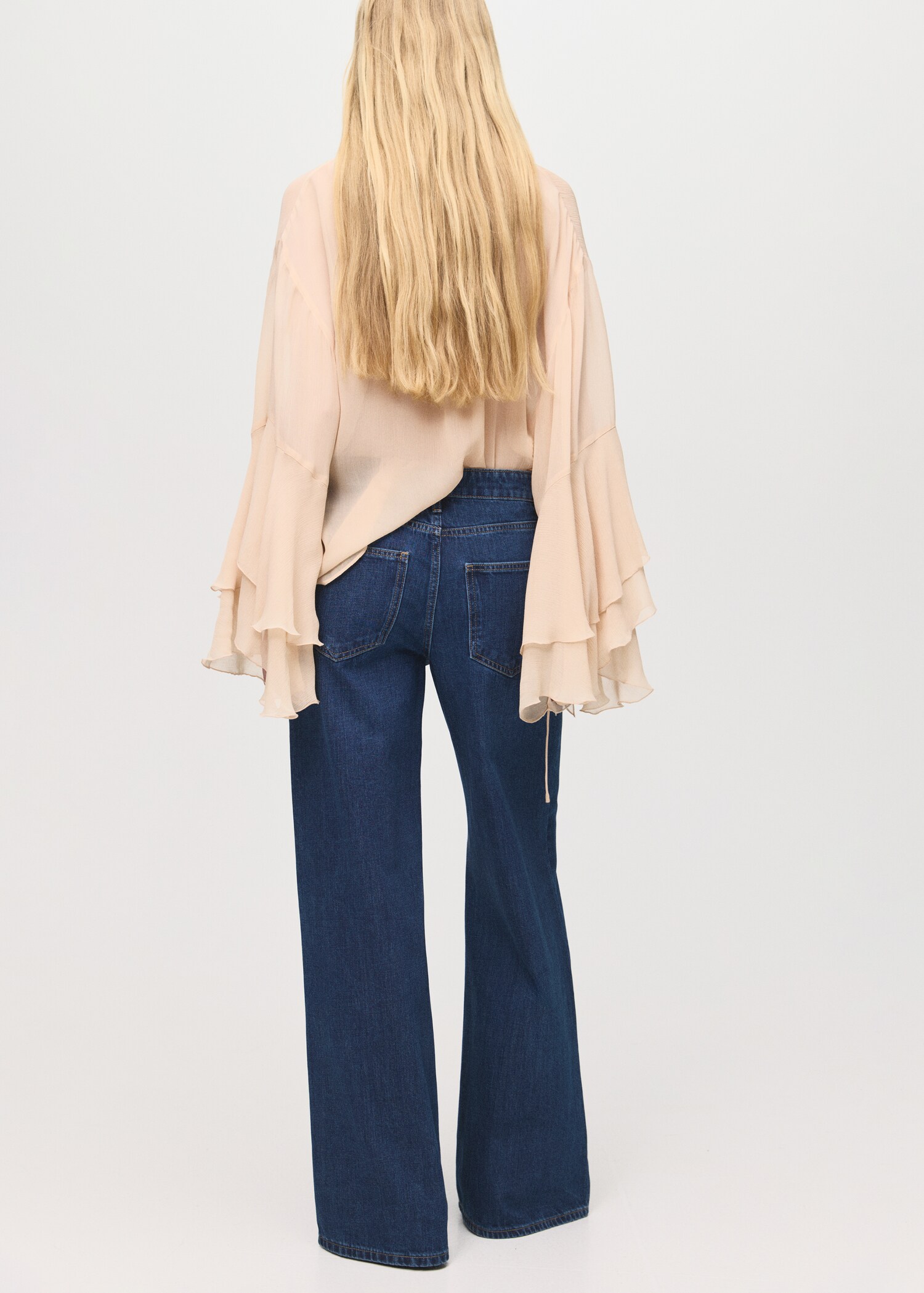 Low-rise wide-leg jeans - Reverse of the article