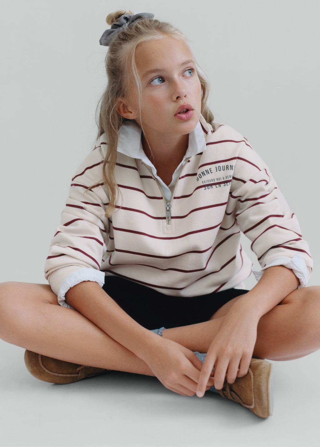 Striped sweatshirt with printed slogan