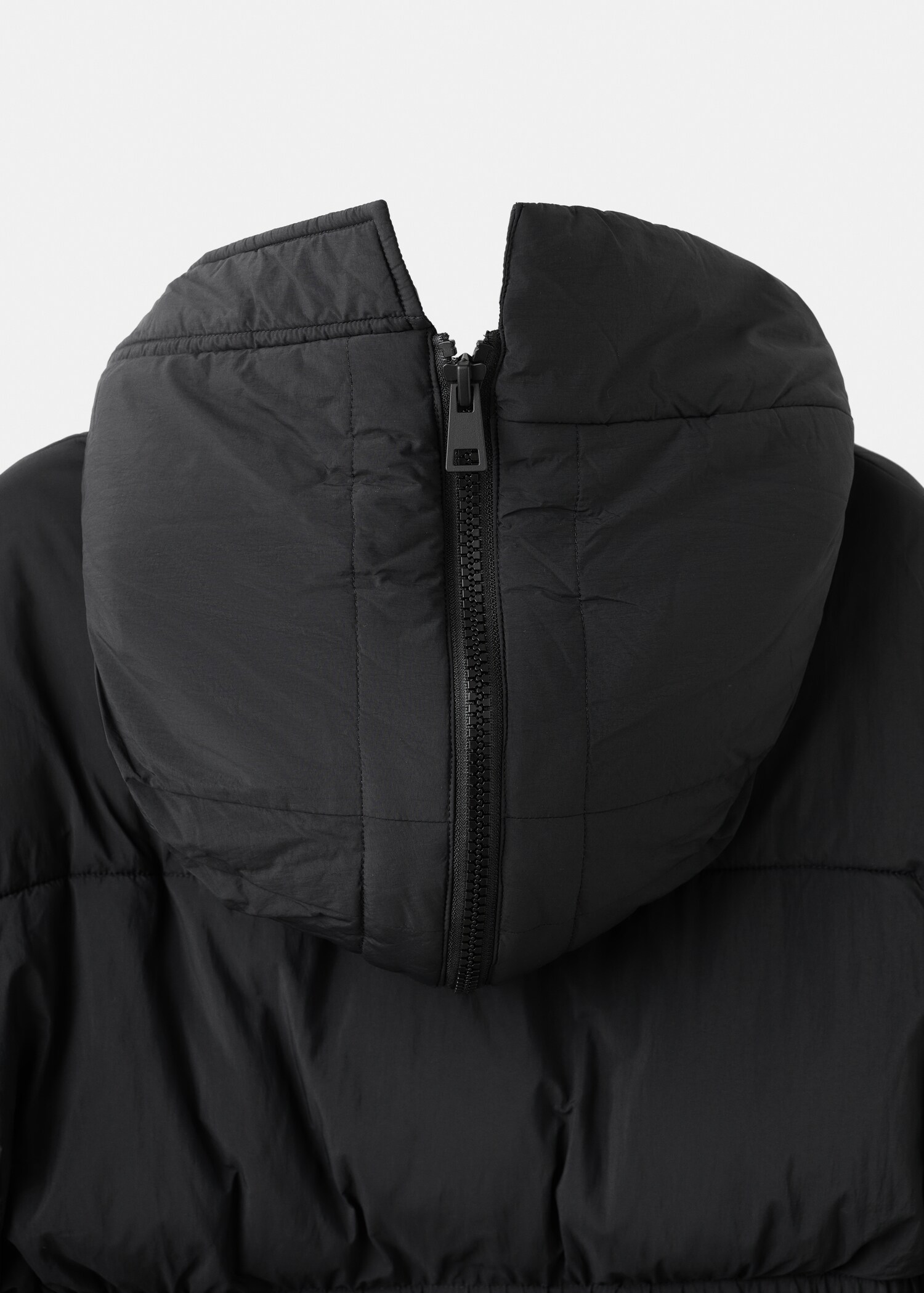 Fitted quilted anorak with hood - Details of the article 0