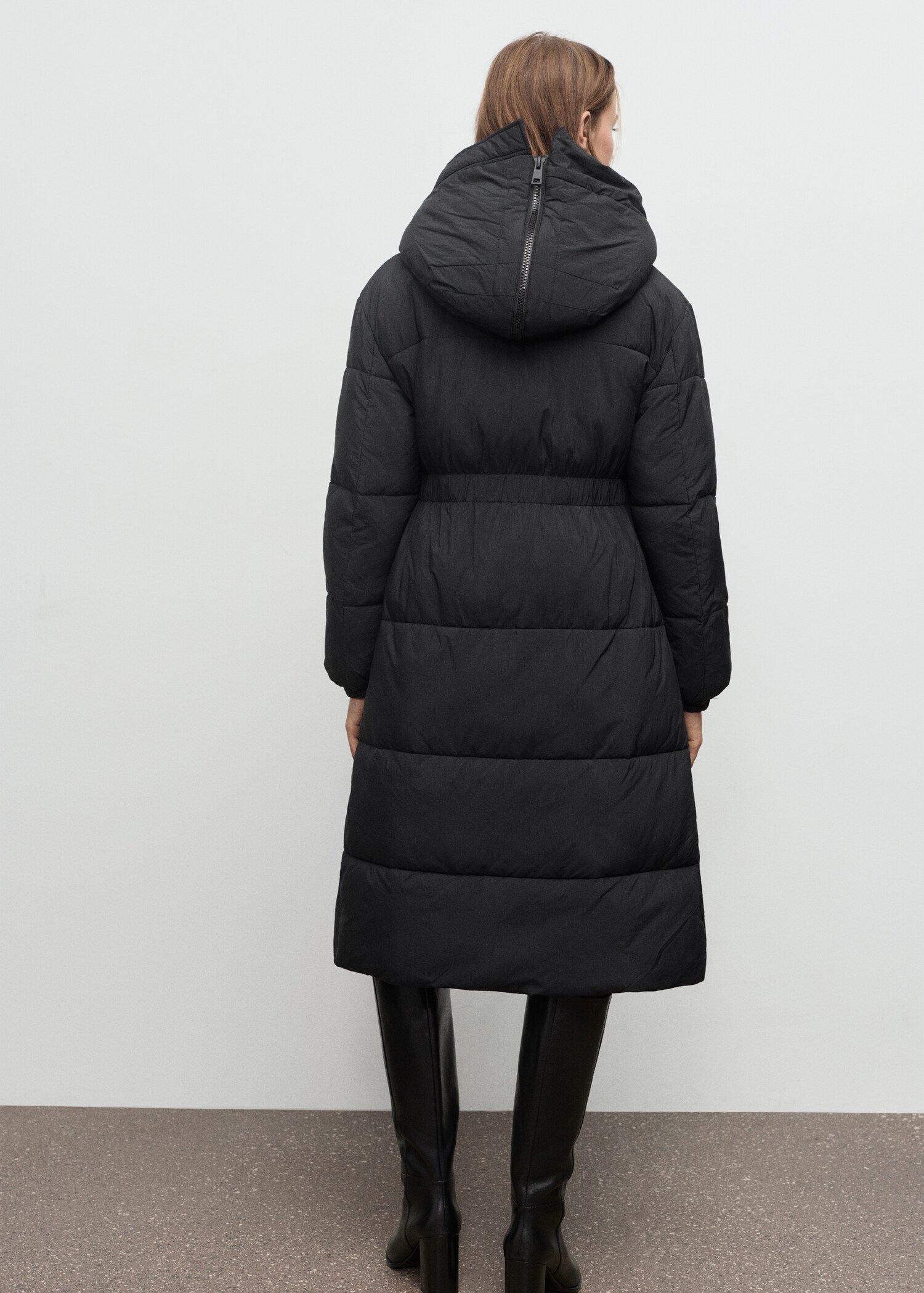 Fitted quilted anorak with hood - Reverse of the article