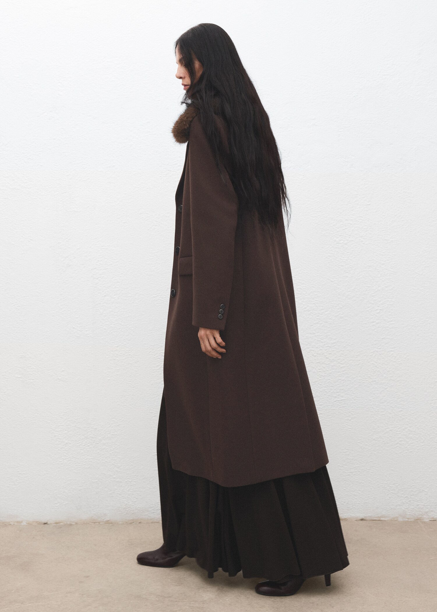 Manteau laine col imitation fourrure - Verso de l’article