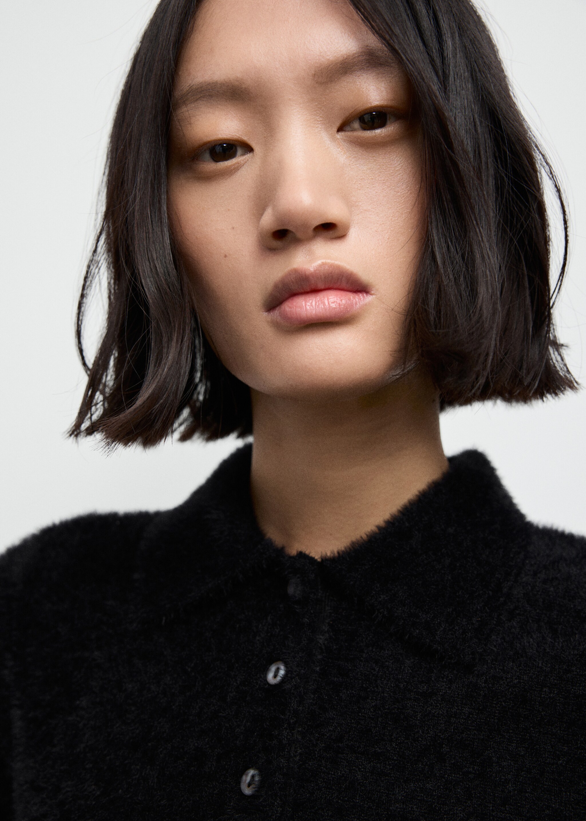 Jersey efecto pelo cuello polo - Detalle del artículo 1, Negro. Ref: 17017782-00.