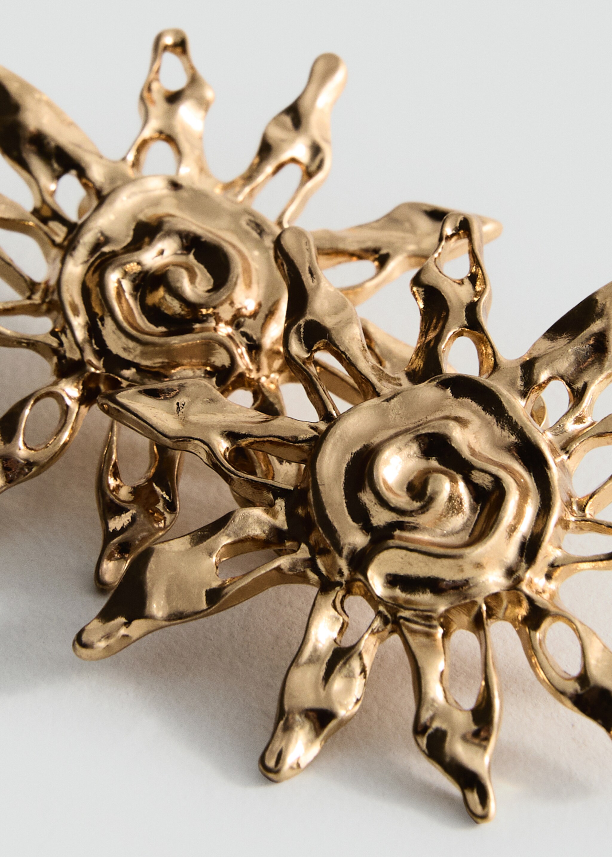 Sun design earrings - Details of the article 1