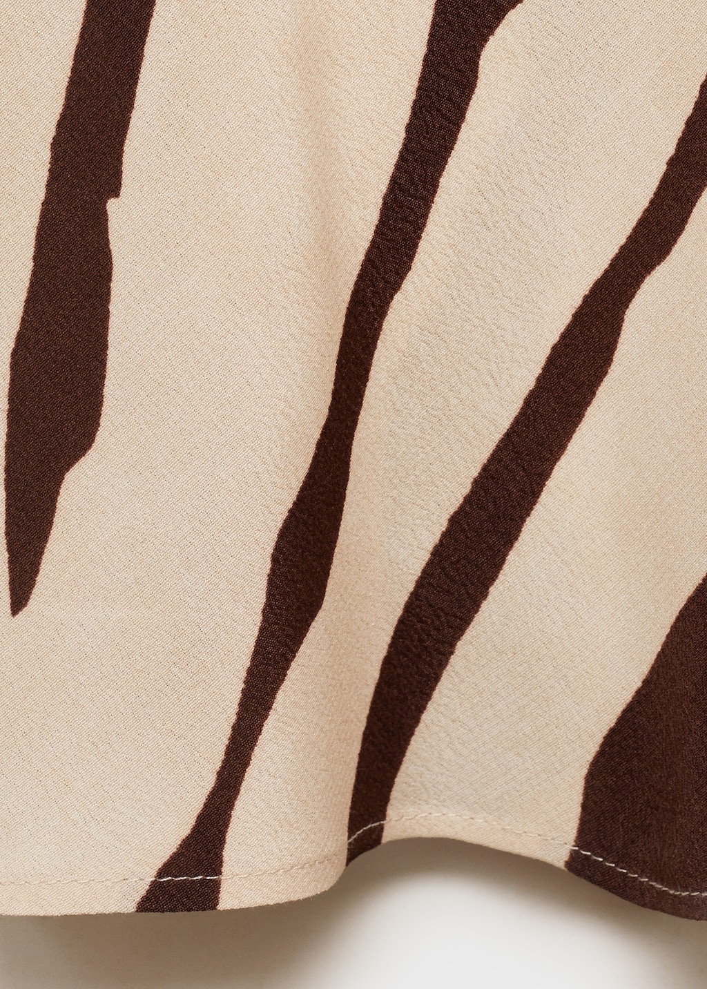 Zebra-print dress with draped neckline
