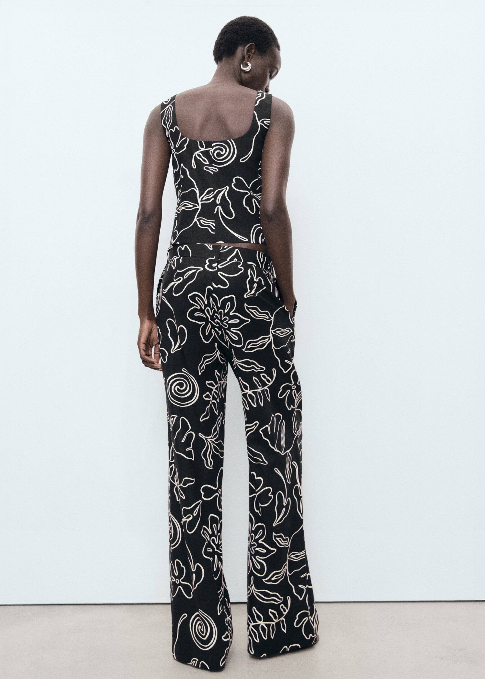 Floral-print linen-blend trousers - Reverse of the article
