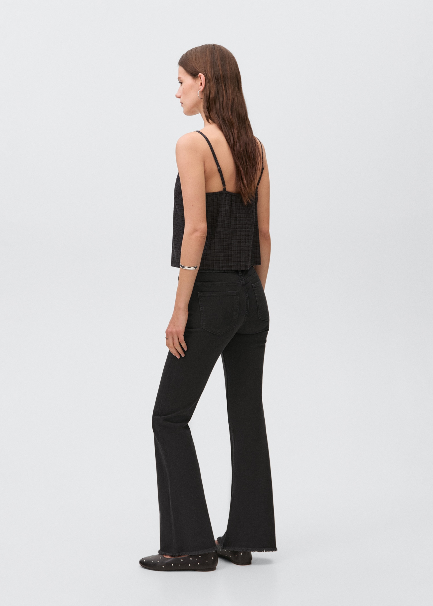 Flared jeans with studs - Reverse of the article