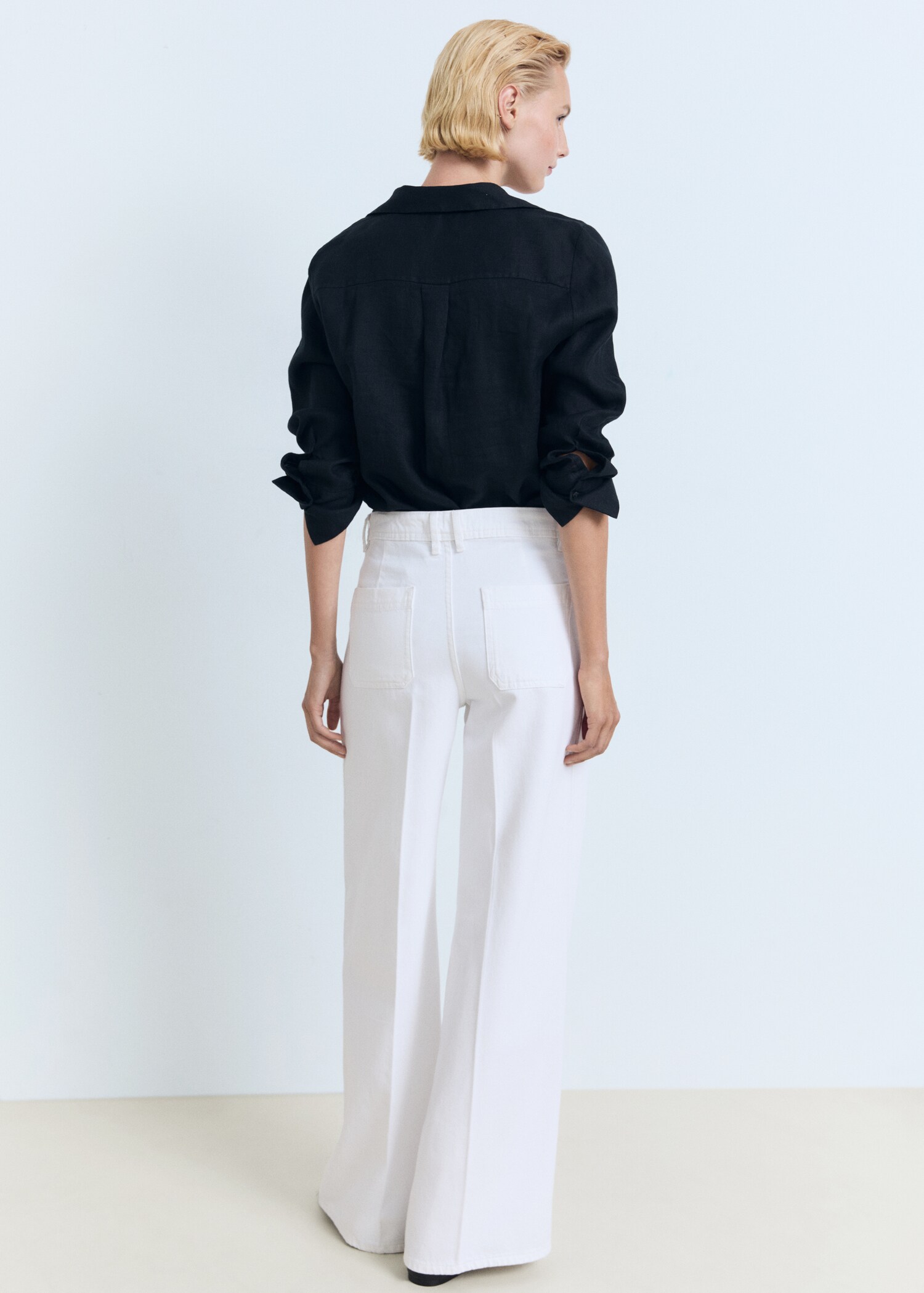 Wide-leg jeans with pockets - Reverse of the article