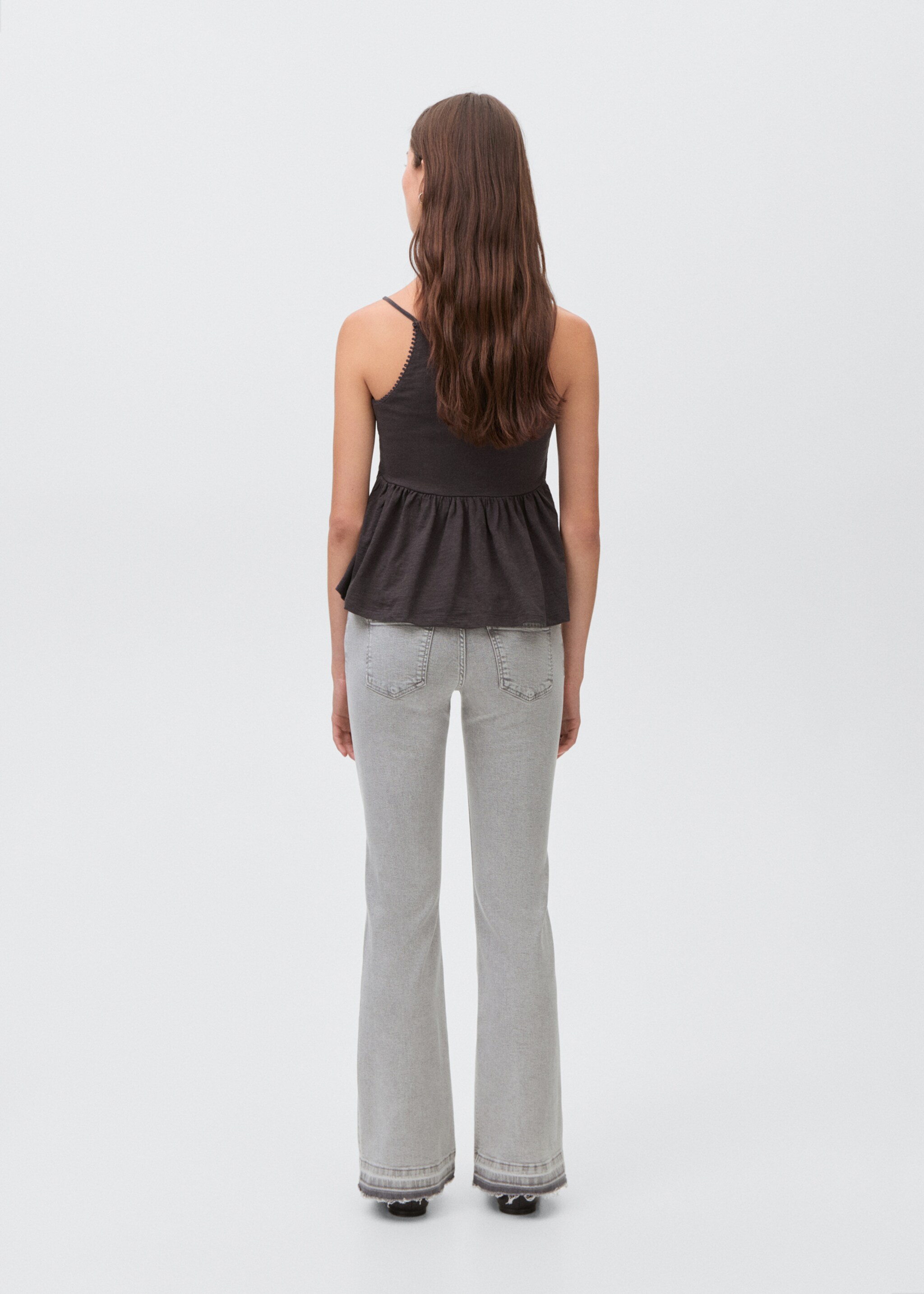 Low-waist flared jeans - Reverse of the article
