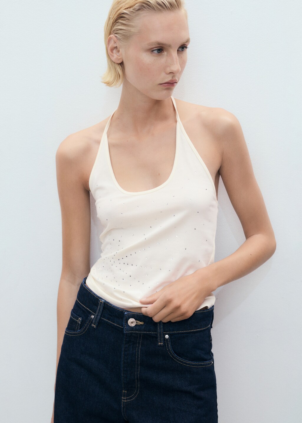Halter neck top with metallic appliqus