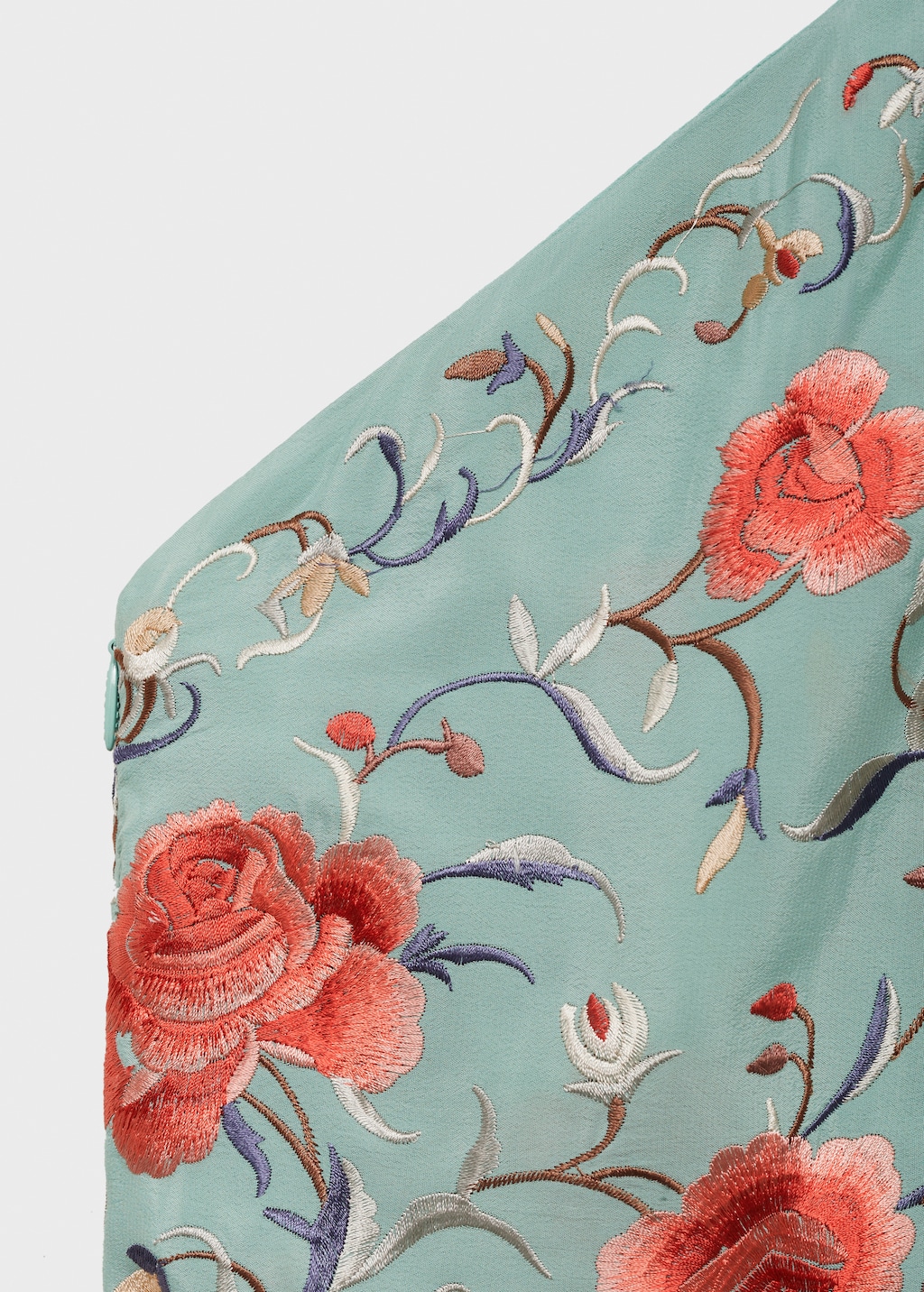 Asymmetrical dress with embroidered fringes