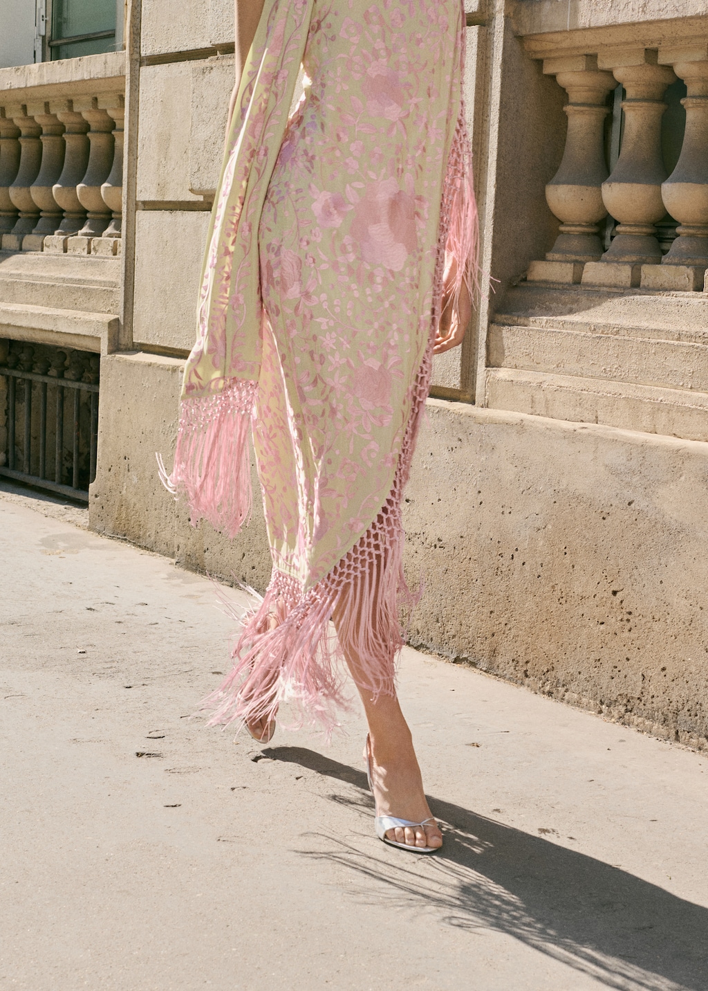 Asymmetrical dress with embroidered fringes