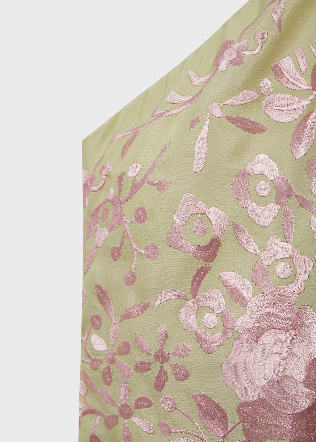 Asymmetrical dress with embroidered fringes