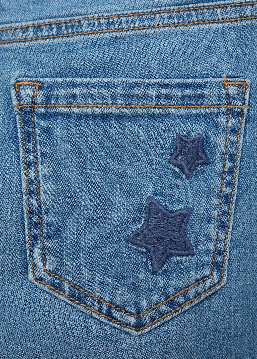 Star-embroidered skinny jeans