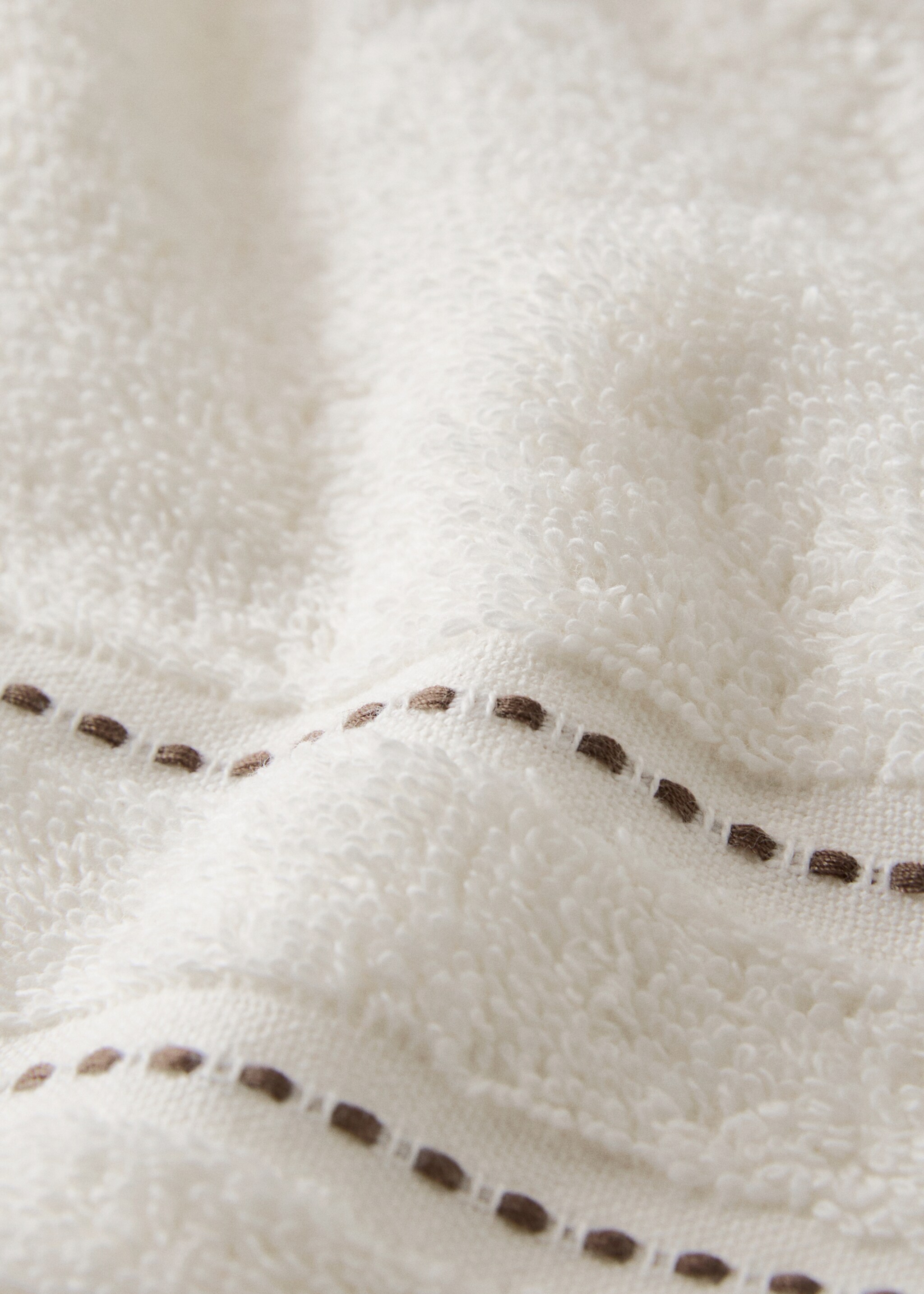 Cotton embroidered dot hand towel - Details of the article 1, Off White. Ref: 17021605-00.