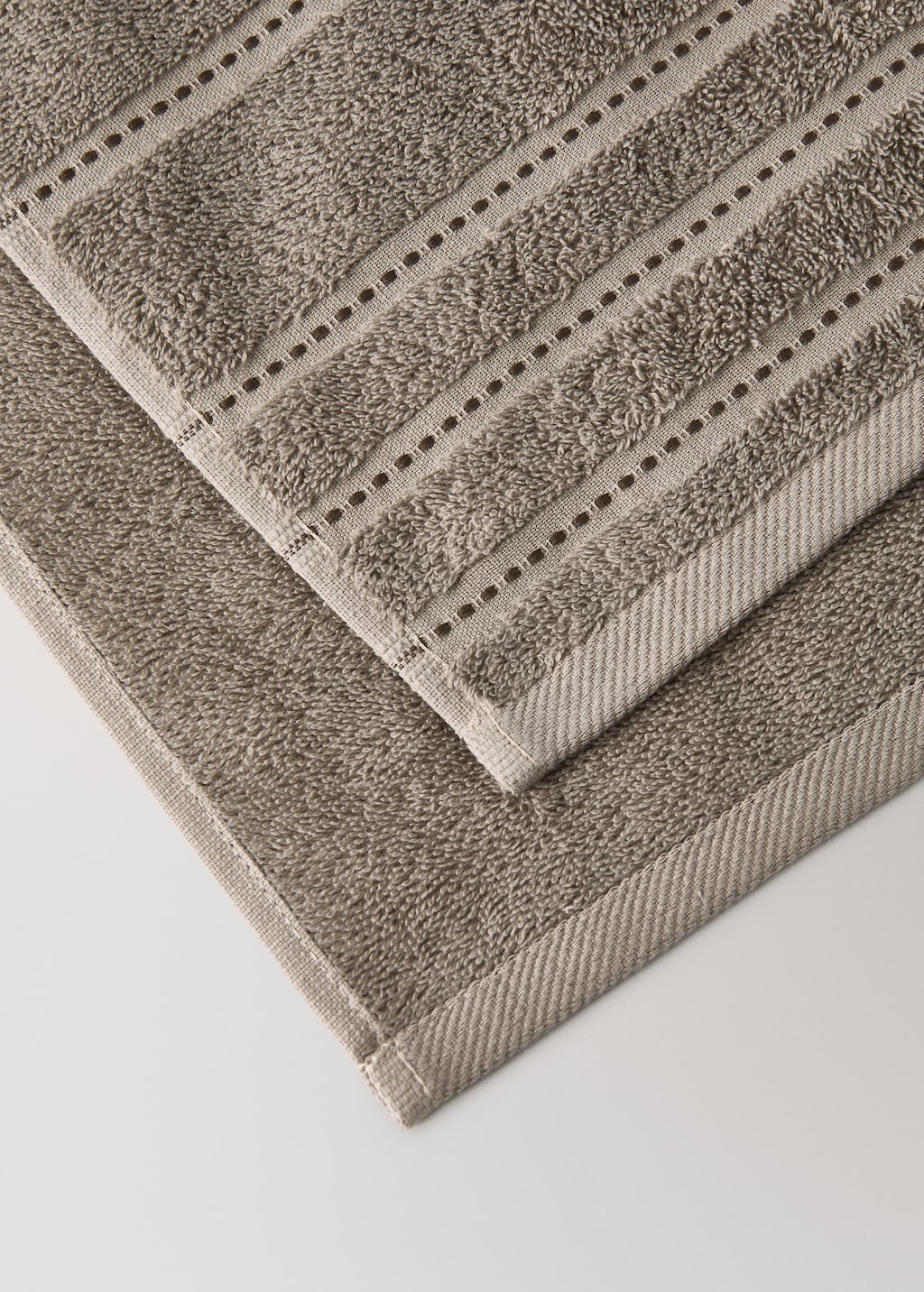 Cotton washbasin towel with embroidered dots