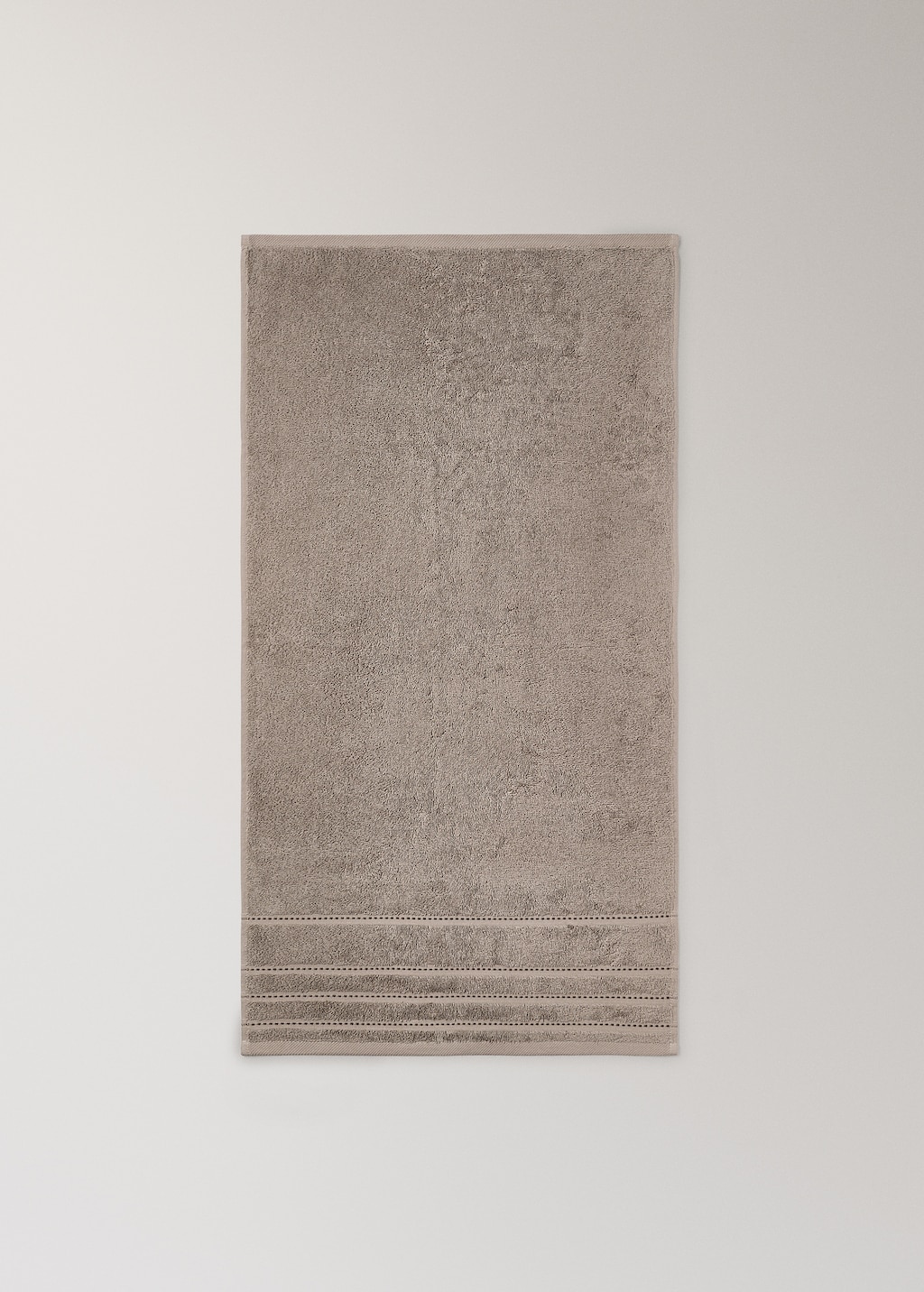 Cotton washbasin towel with embroidered dots