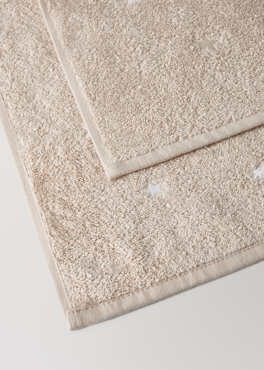 Children's bath towel with glow-in-the-dark stars