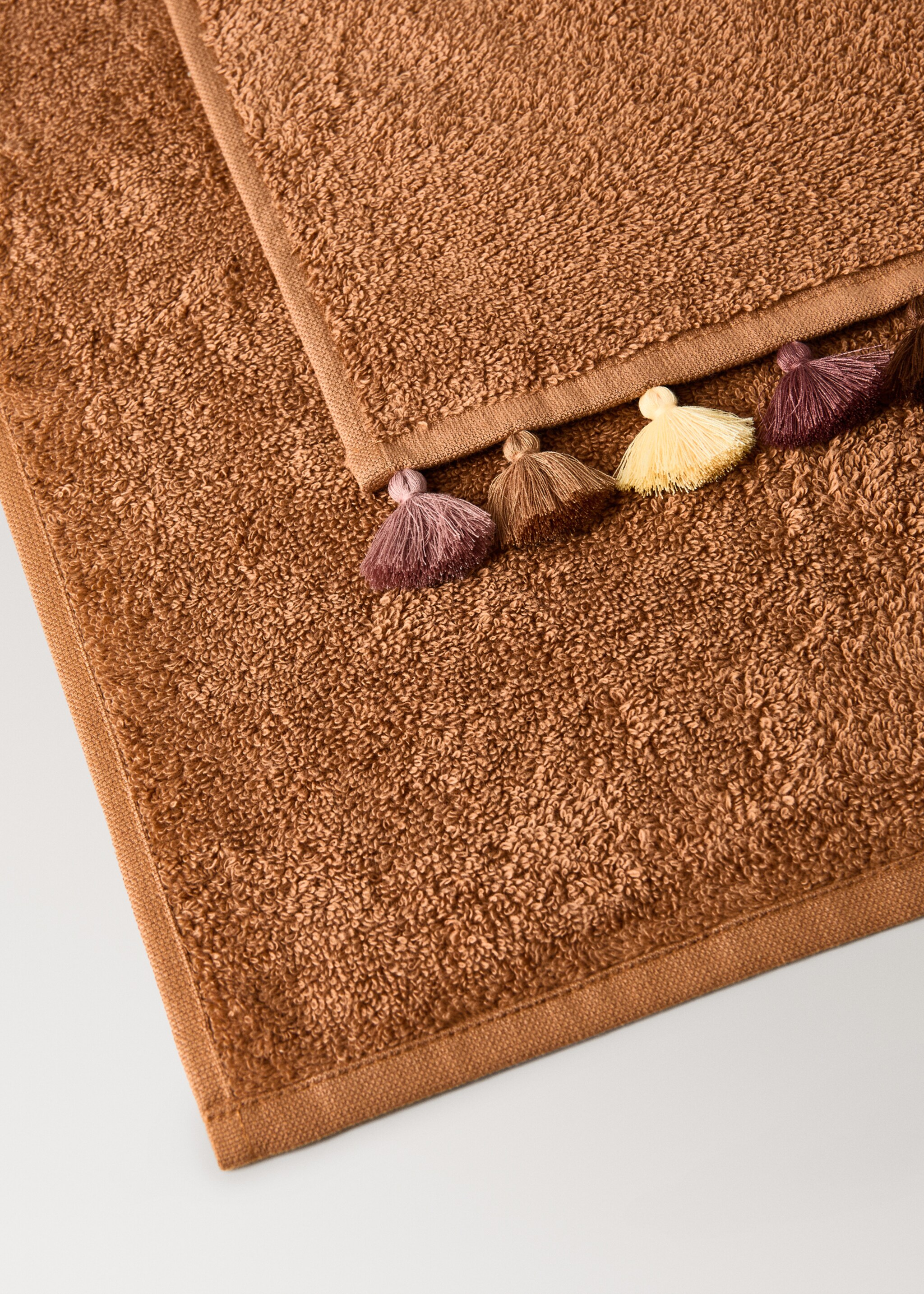 Cotton children's multi-coloured hand towel with pompoms - Details of the article 1, Brown. Ref: 17021628-00.