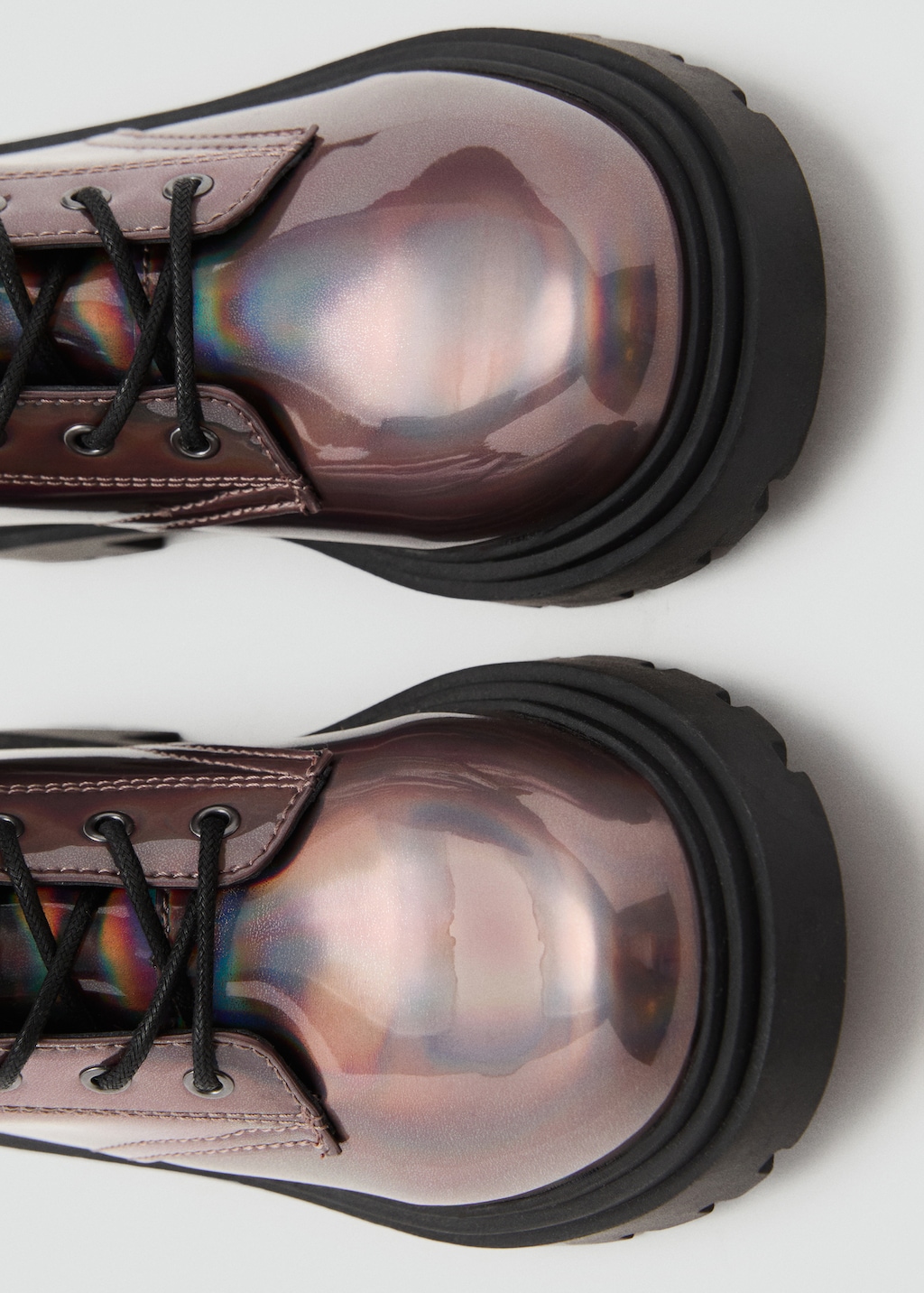 Zipped metallic boots