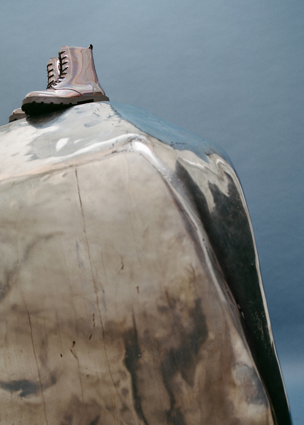 Zipped metallic boots