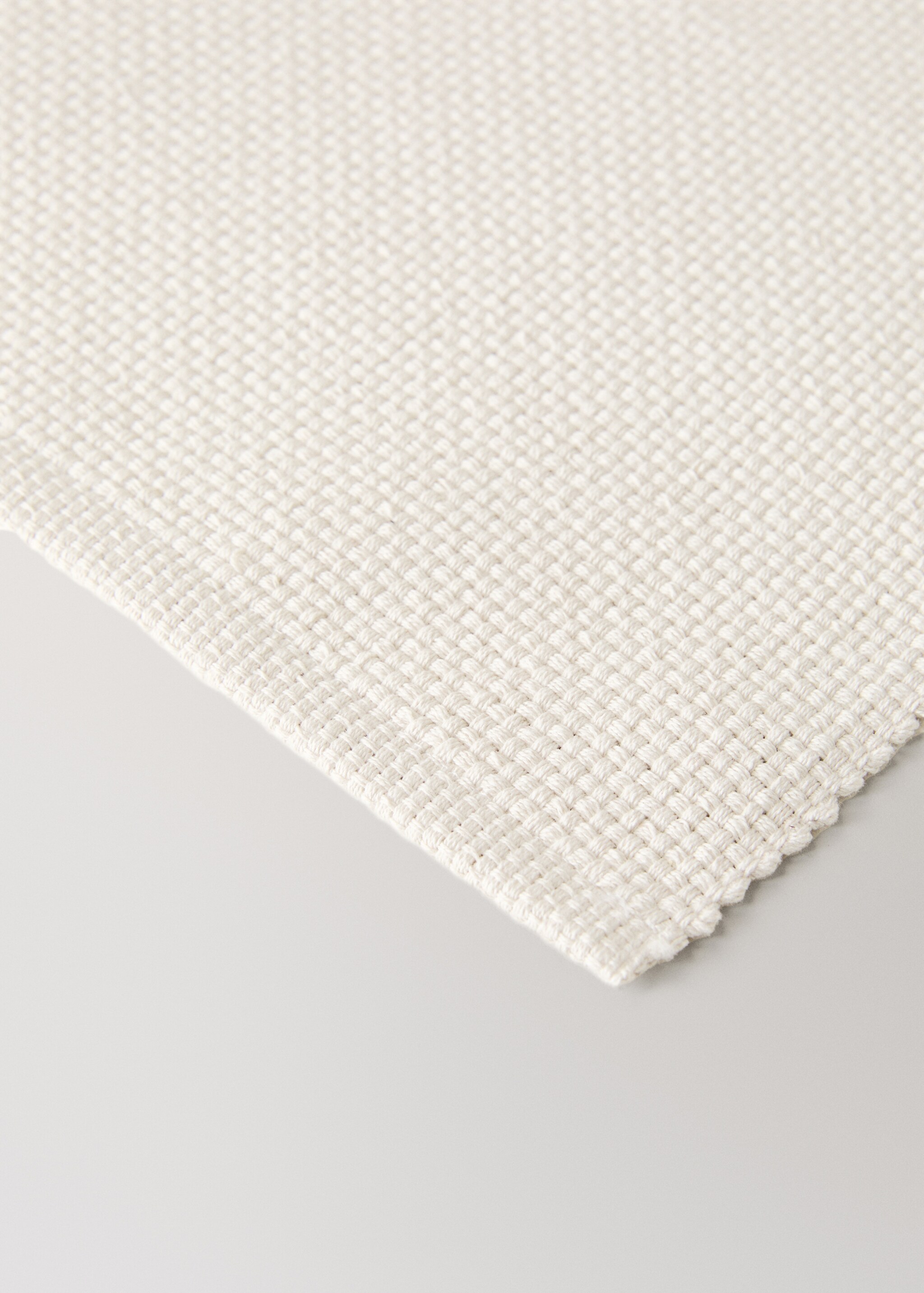Cotton placemat made from piqué-textured cotton fabric - Details of the article 2, Off White. Ref: 17024126-00.