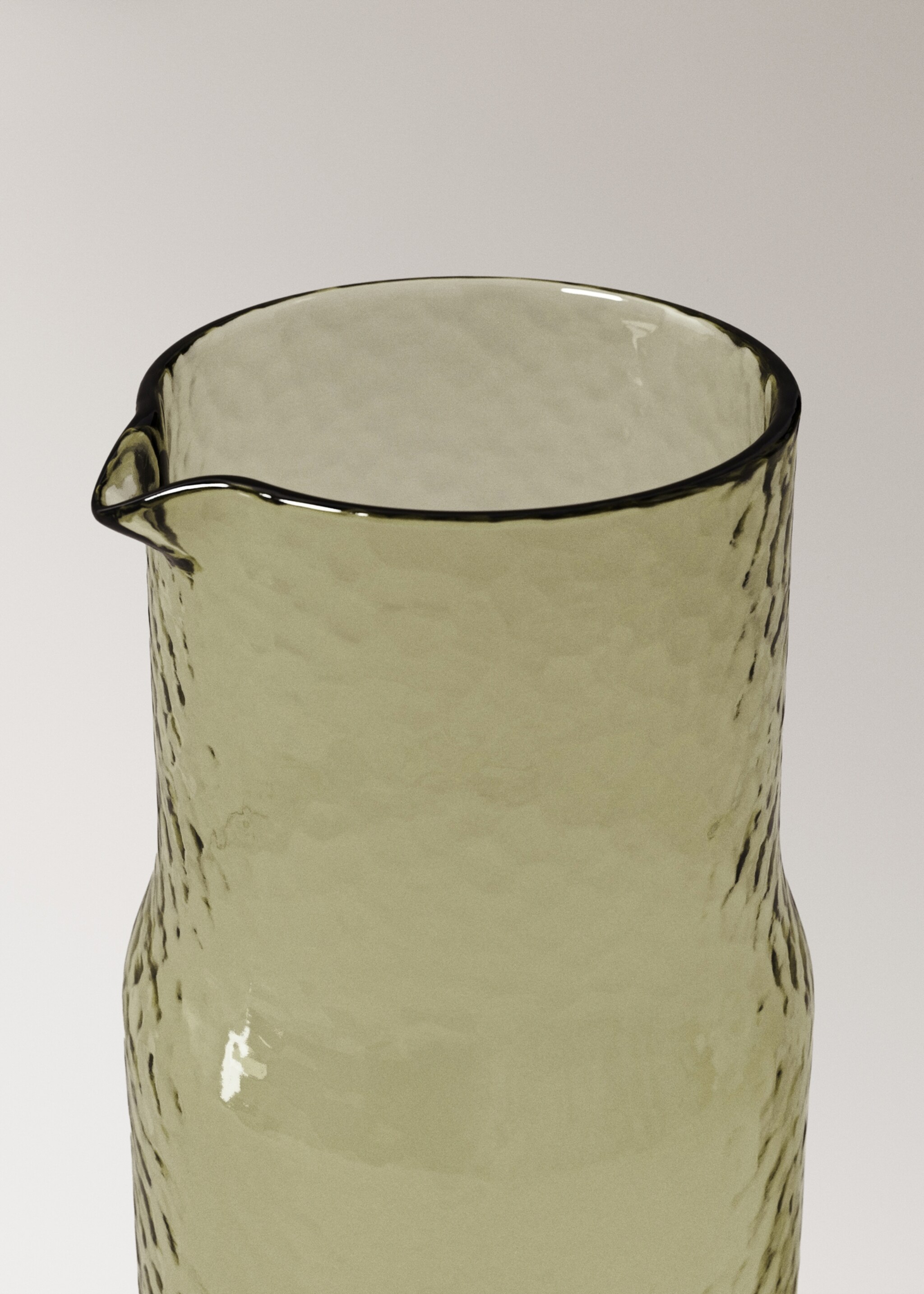 Hammered glass jug - Details of the article 1, Green. Ref: 17024441-00.