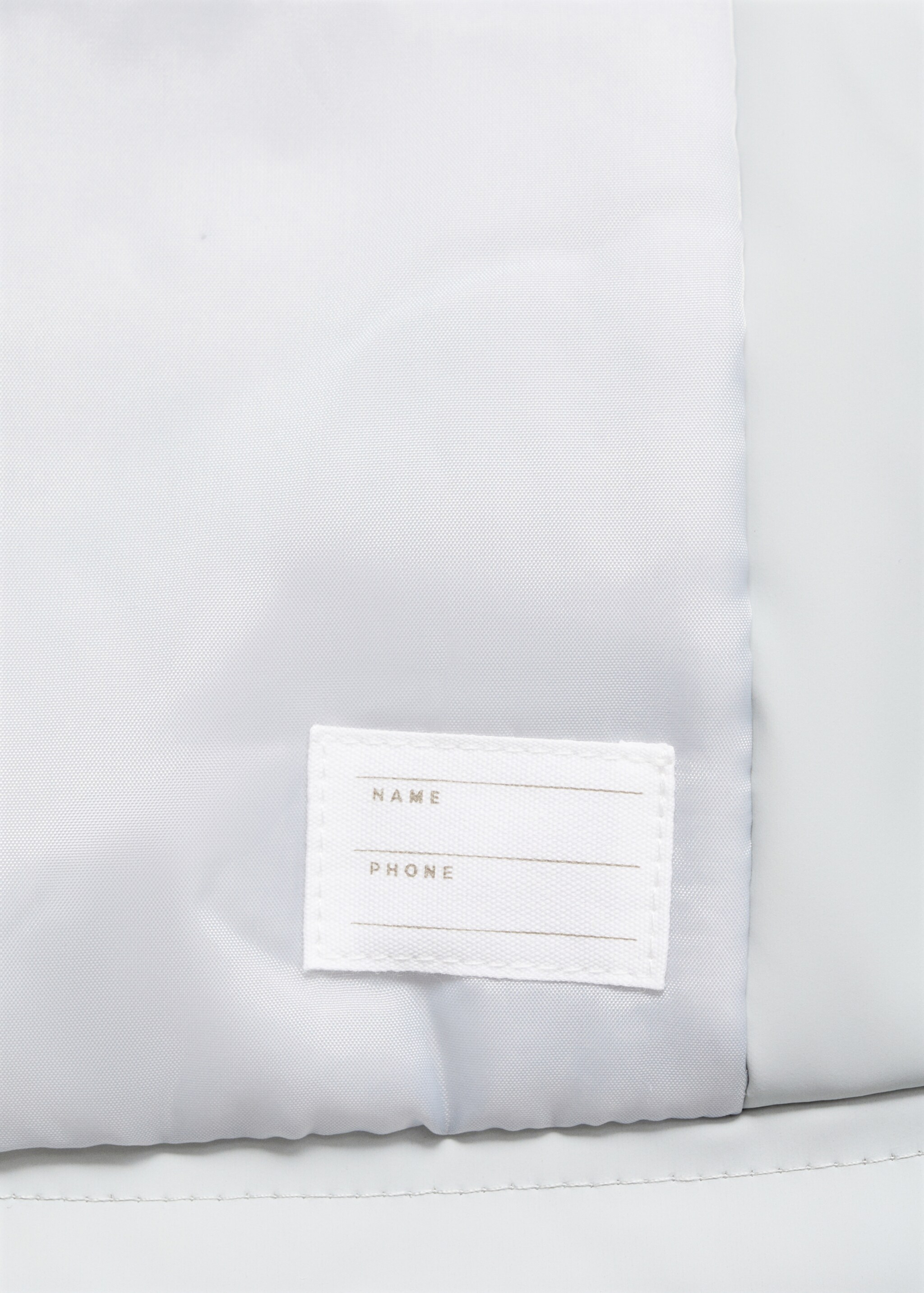 Manteau imperméable à capuche - Détail de l'article 8