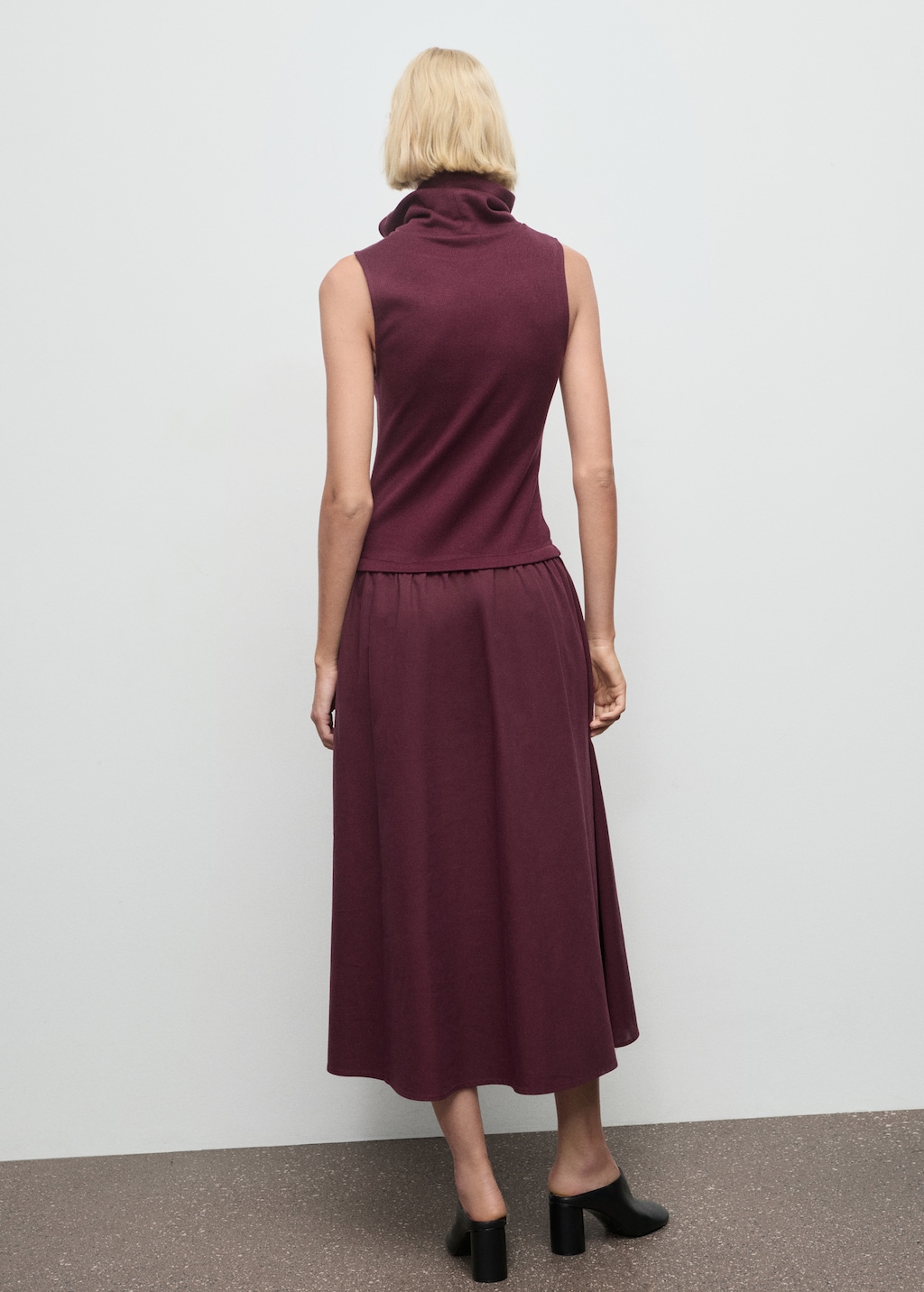 Dress with combined funnel neck
