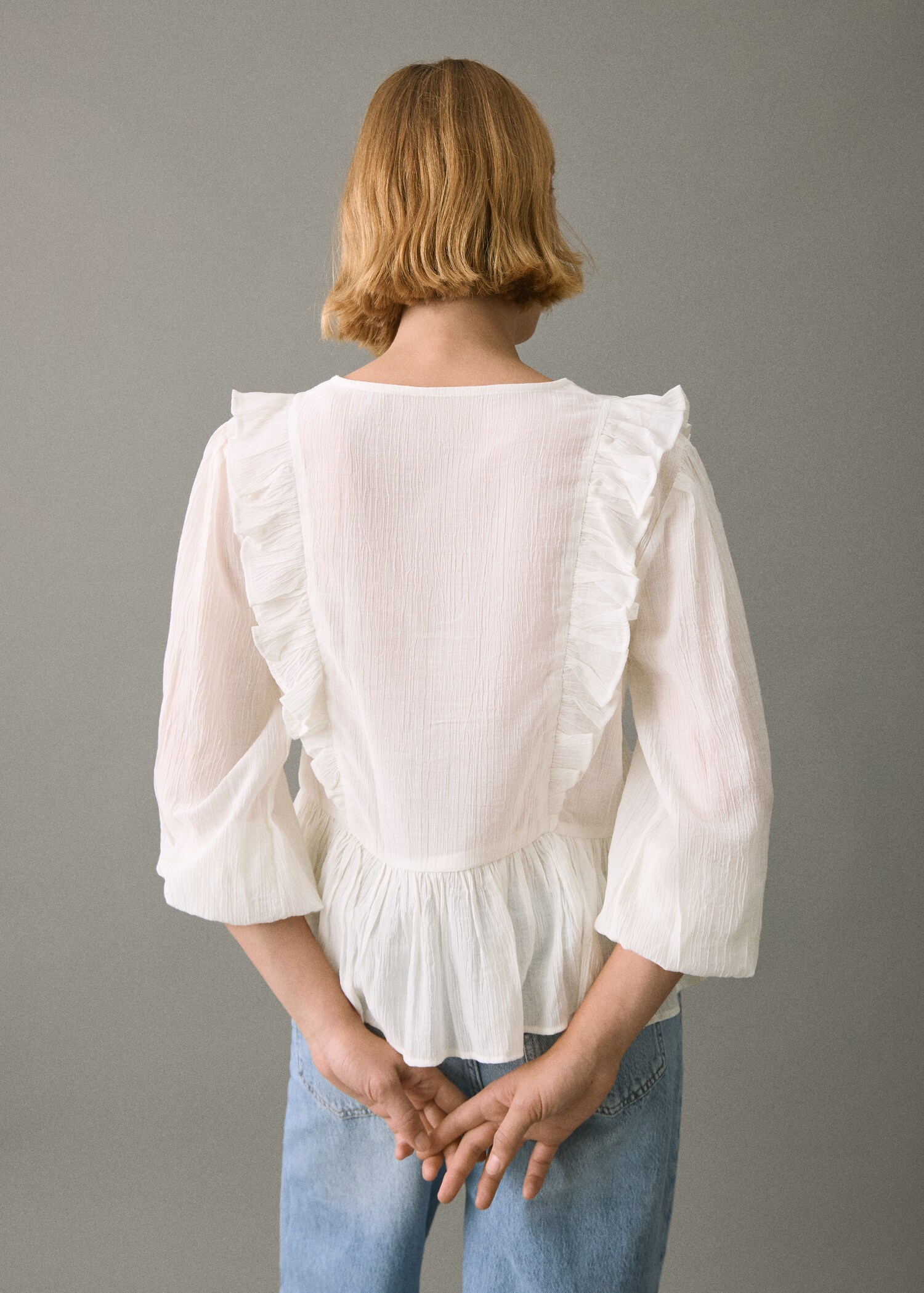 Blusa volantes fluida - Reverso del artículo