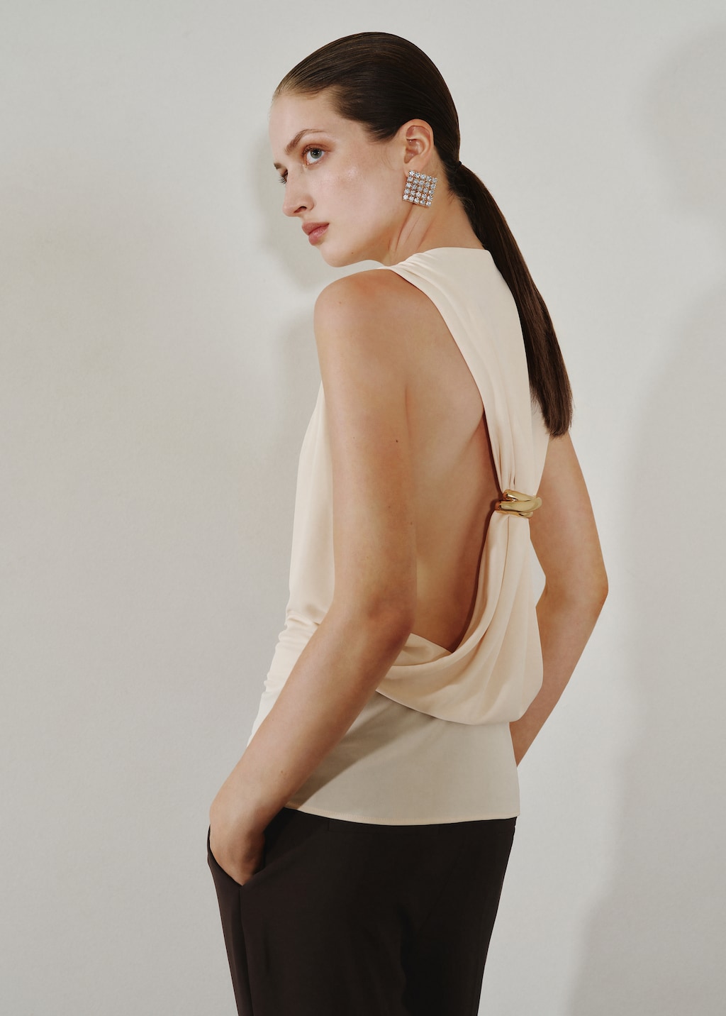 Draped top with metallic detail