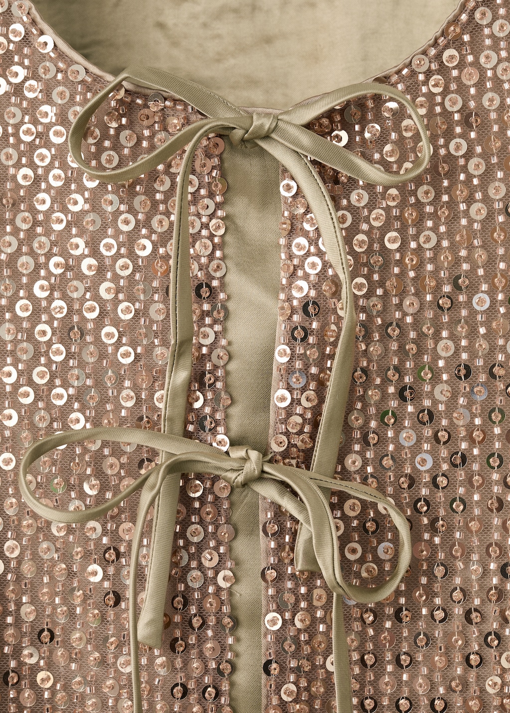 Top with sequins and bow