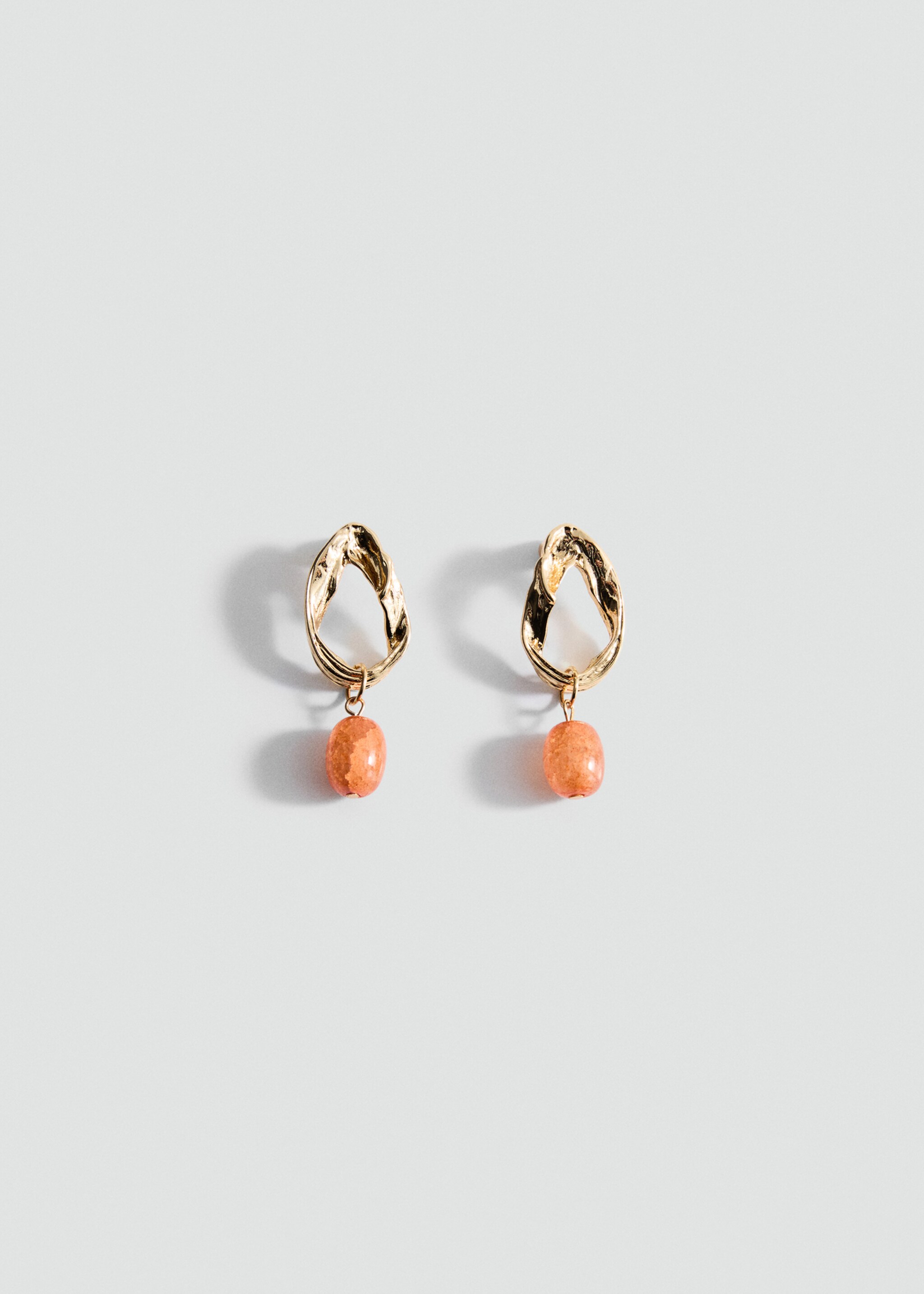 Circular bead-design earrings - Article without model