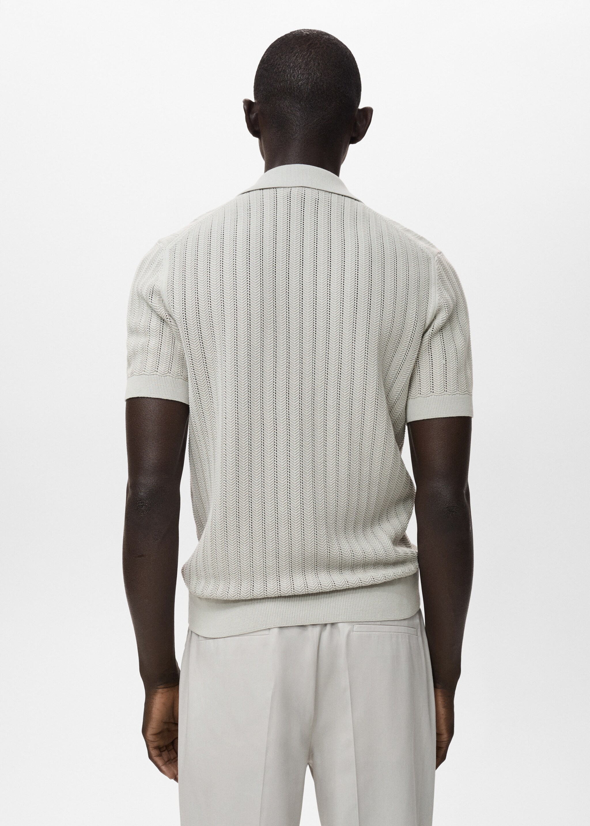 Fijngebreid visgraatpoloshirt - Achterkant van het artikel