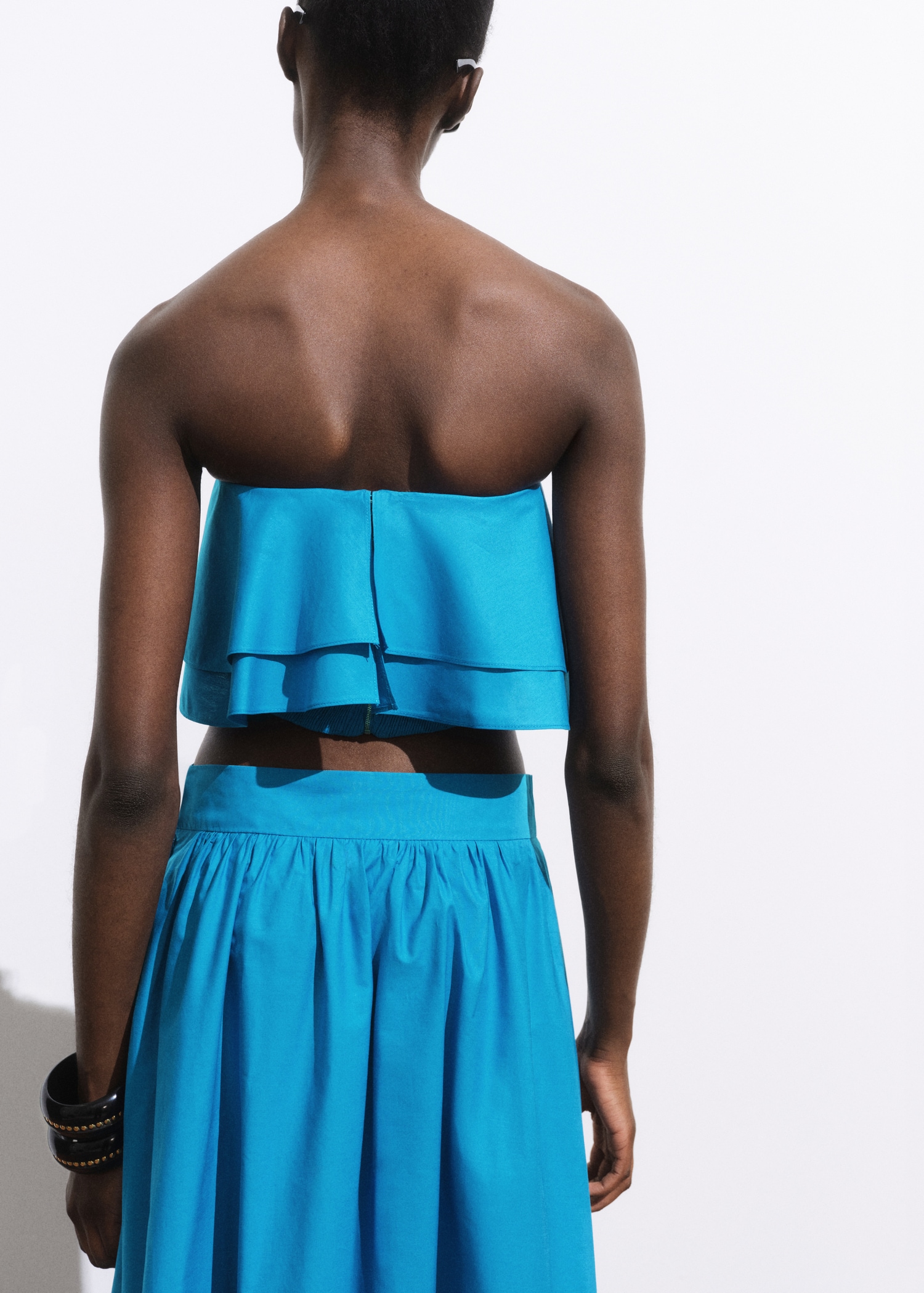 Strapless top with ruffles - Reverse of the article