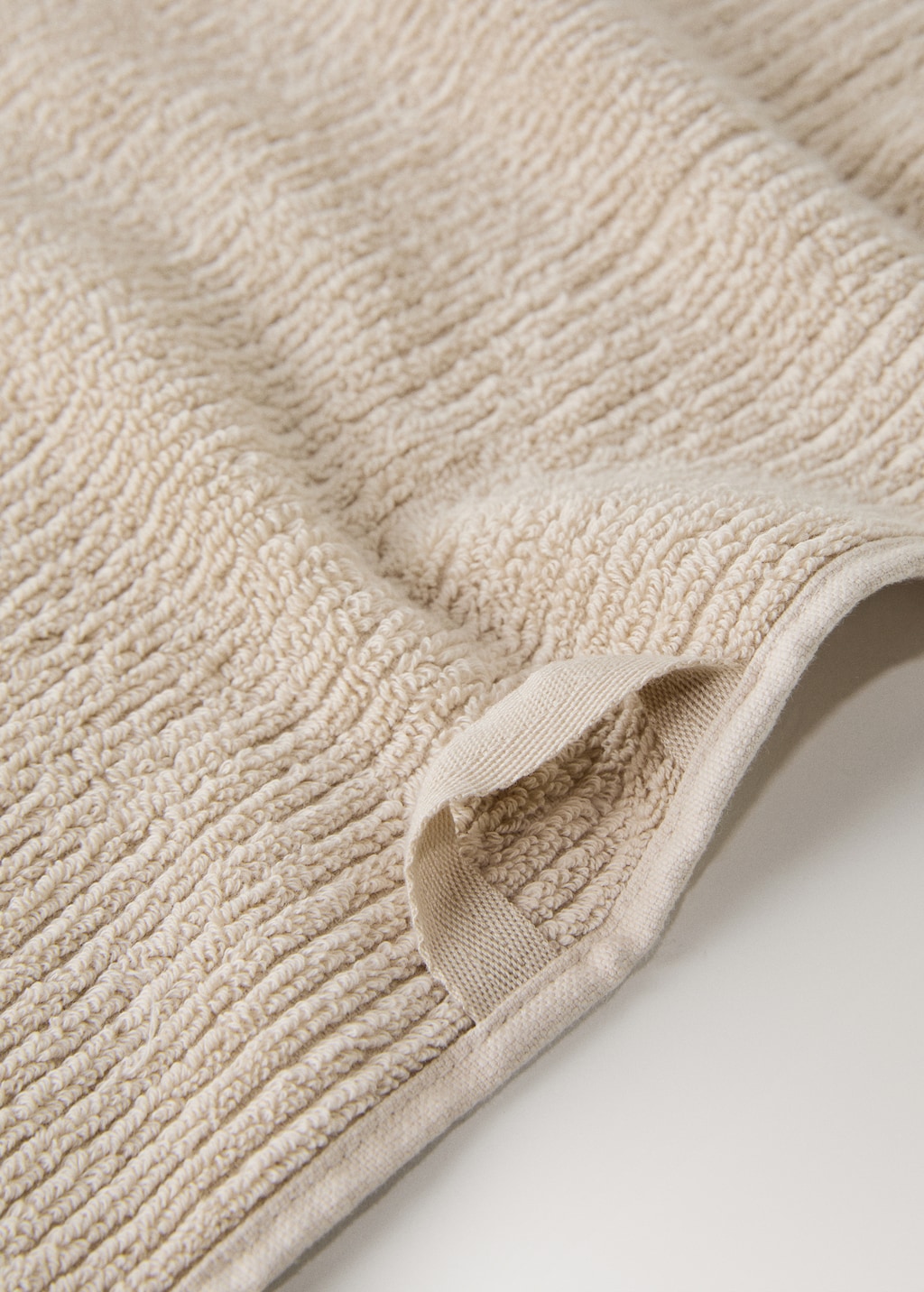 Textured hand towel with fringes