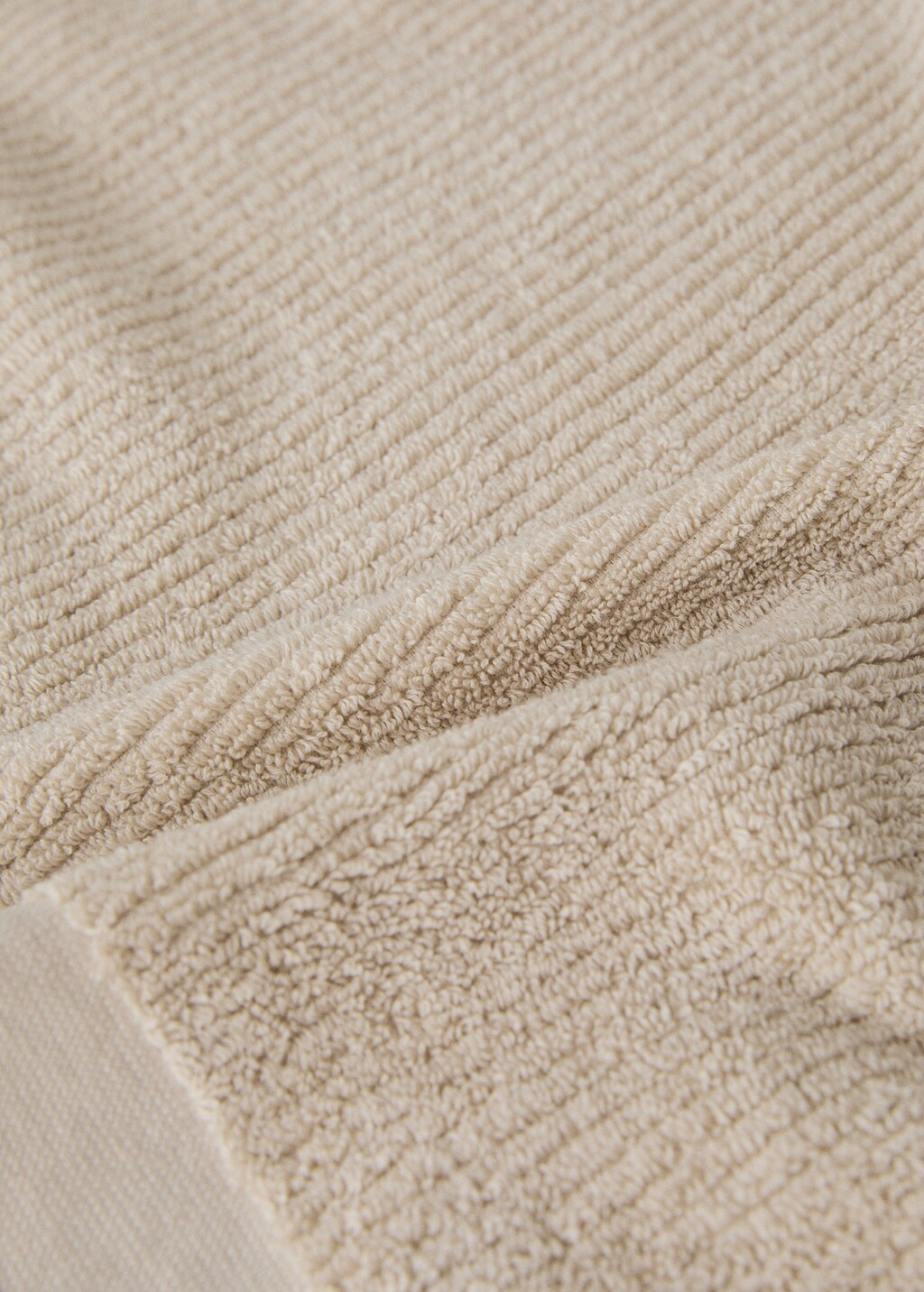 Textured hand towel with fringes