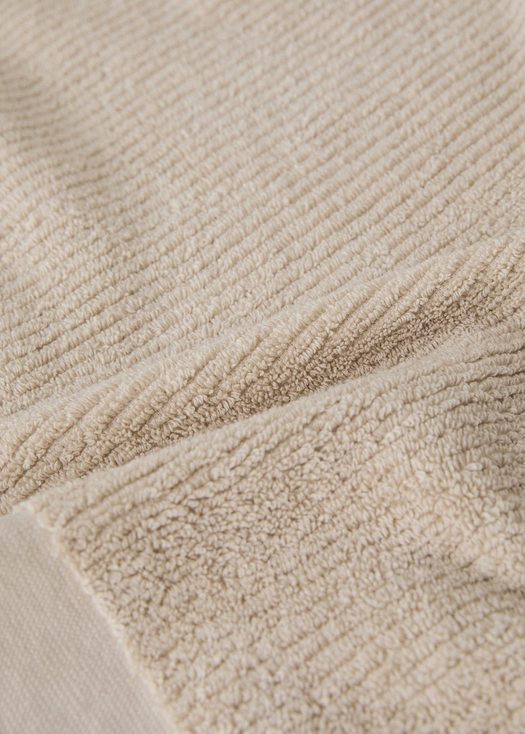 Textured hand towel with fringes