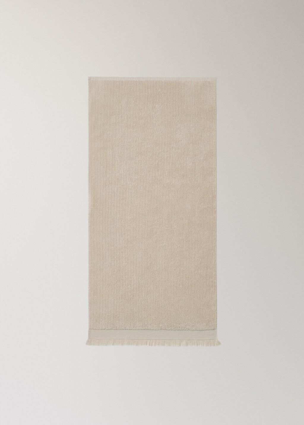 Textured hand towel with fringes