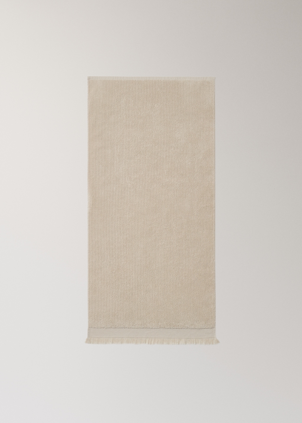 Textured hand towel with fringes