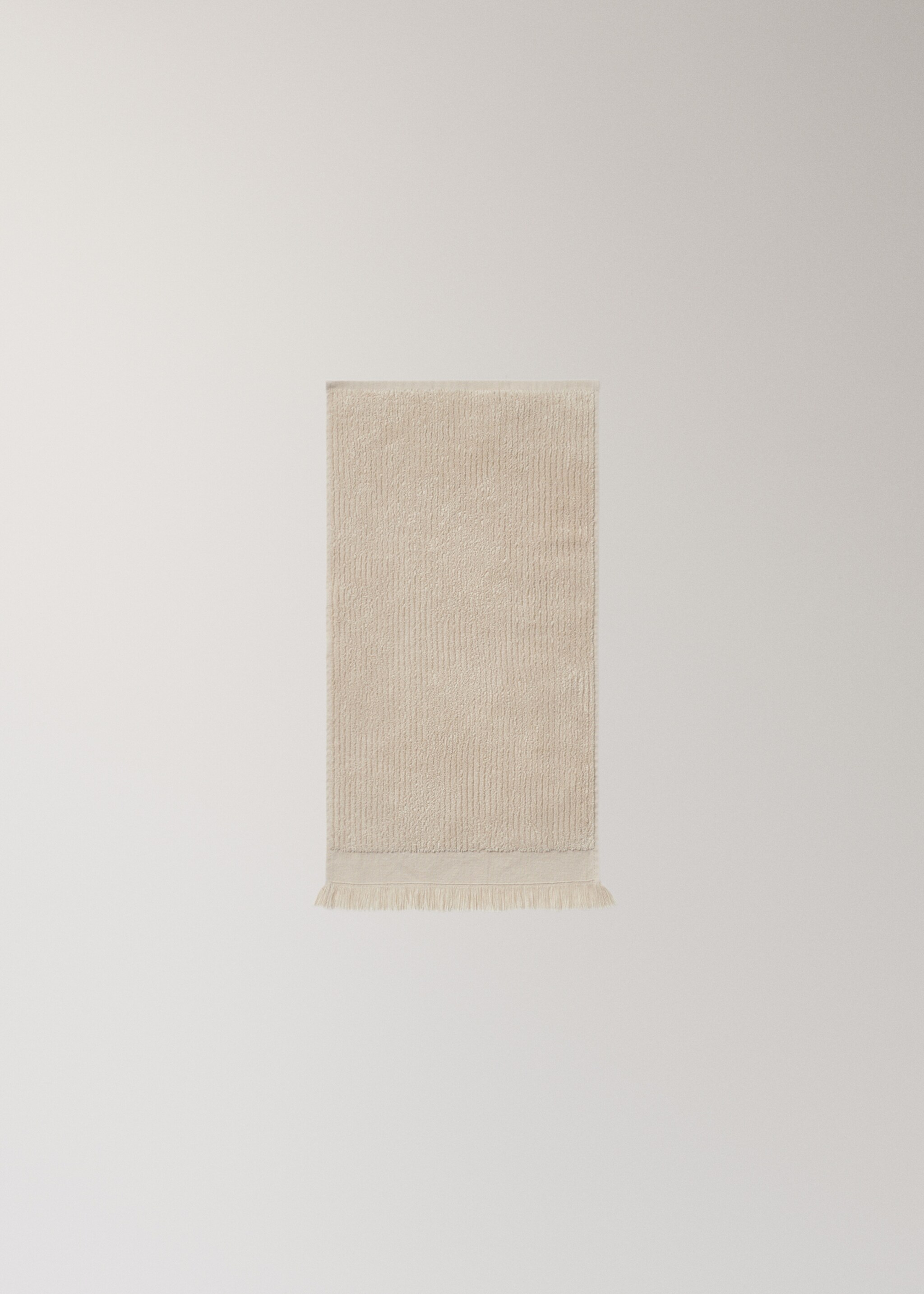 Textured guest towel with fringes - Details of the article 4, Sand. Ref: 17031580-00.