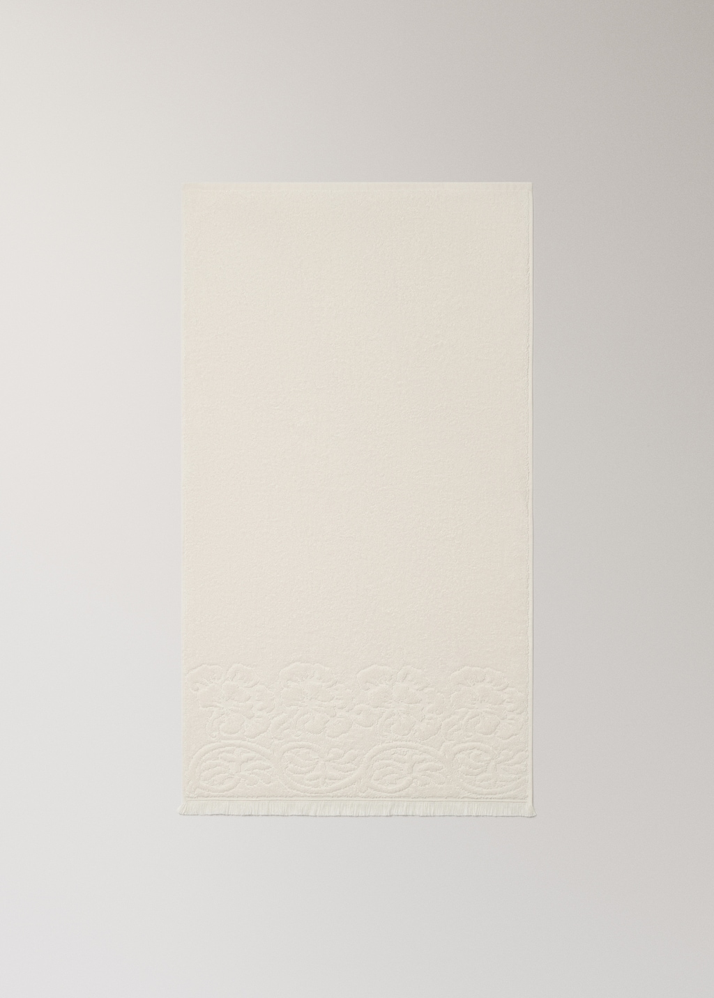 Washbasin towel with floral trim